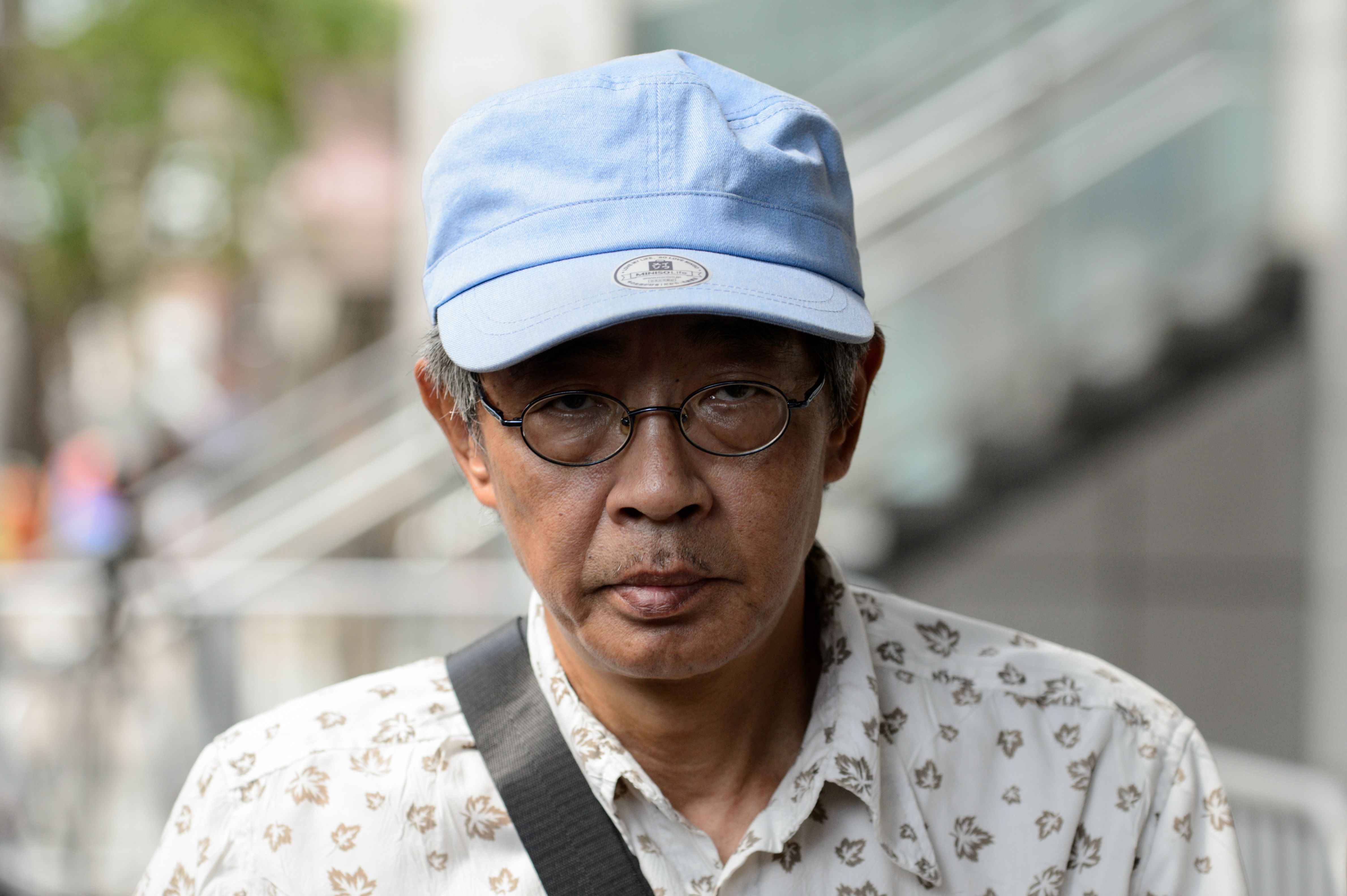 Hong Kong bookseller Lam Wing-kee at Wanchai police station in Hong Kong on June 27, 2016. (Anthony Wallace—AFP/Getty Images)