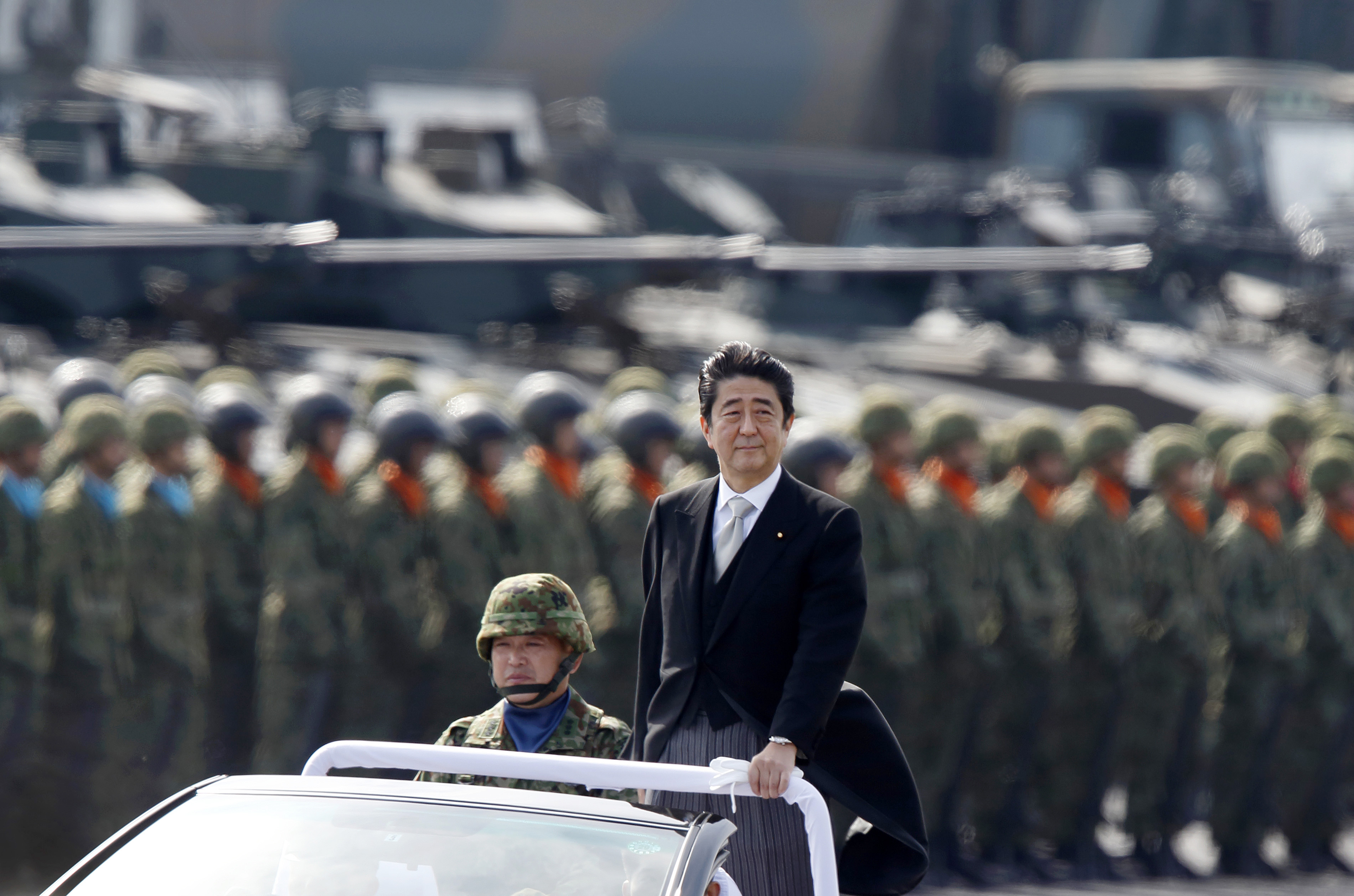 Japanese Prime Minister Shinzo Abe at the Japan Ground Self-Defense Force Camp in Asaka, Japan, on Oct. 23, 2016. (Tomohiro Ohsumi—Getty Images)