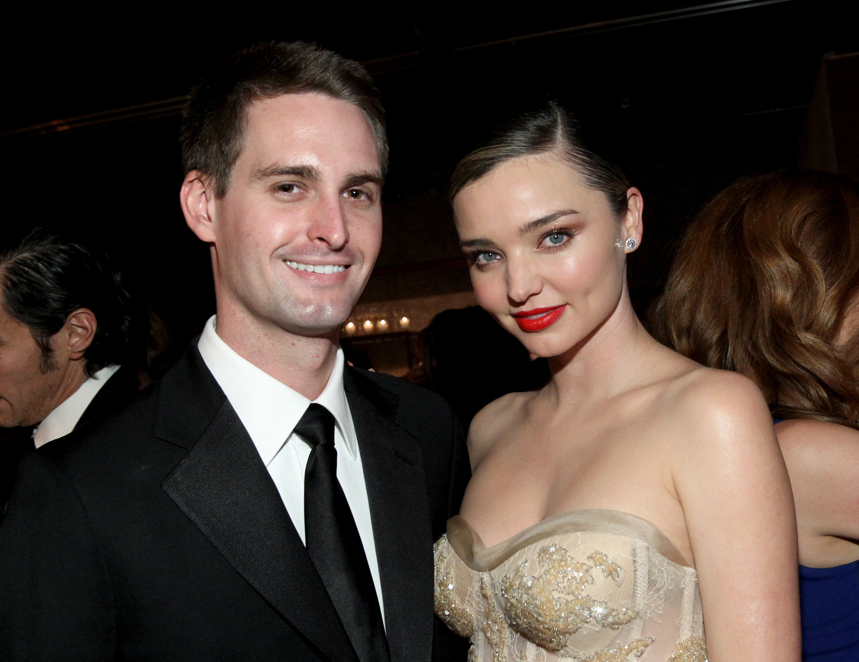 Founder, Snapchat Evan Spiegel (L) and model Miranda Kerr attend the Fifth Annual Baby2Baby Gala, Presented By John Paul Mitchell Systems at 3LABS on November 12, 2016 in Culver City, California. (Tommaso Boddi&mdash;Getty Images for Baby2Baby)