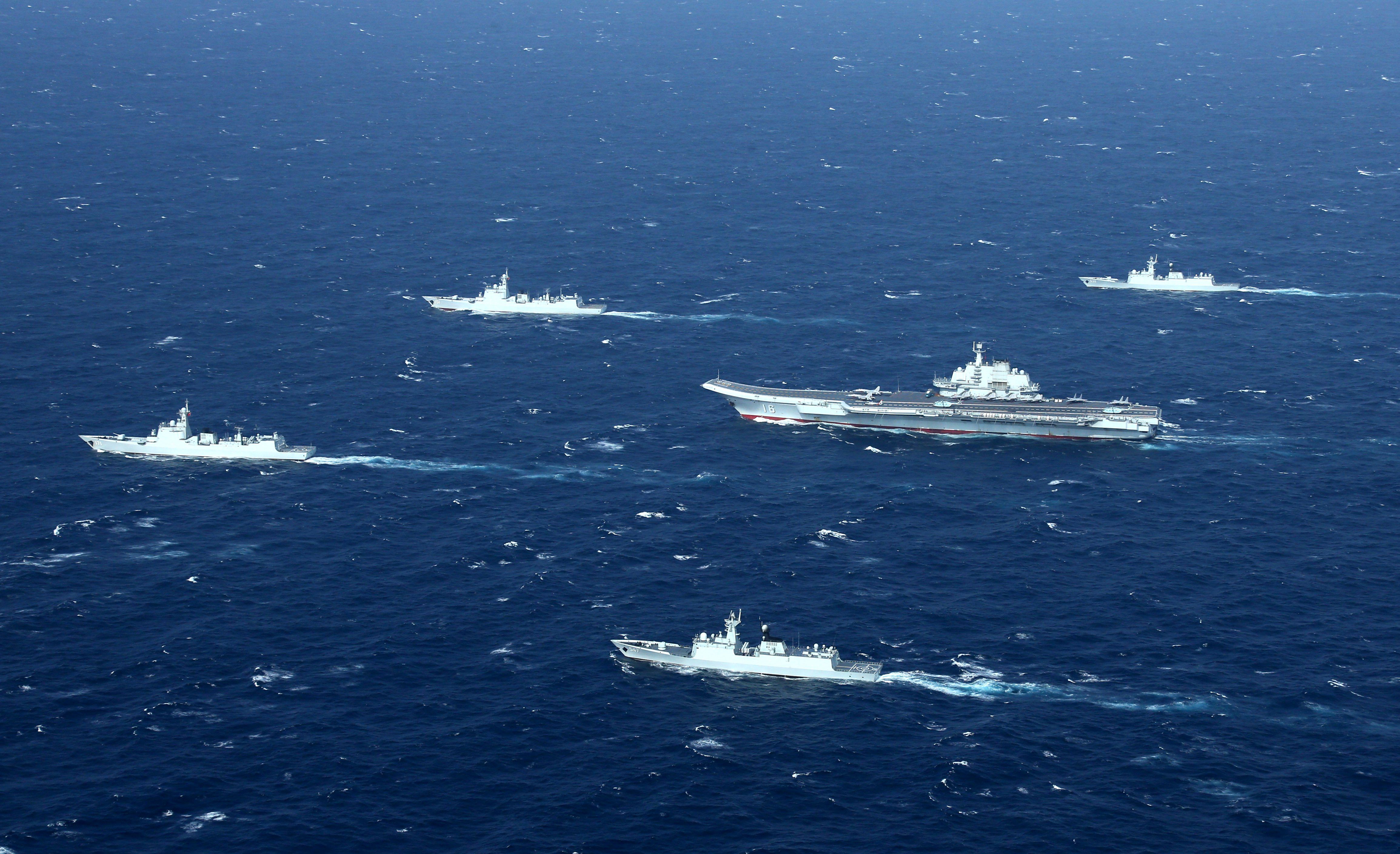 This aerial photo taken on January 2, 2017 shows a Chinese navy formation, including the aircraft carrier Liaoning (C), during military drills in the South China Sea. (STR—AFP/Getty Images)