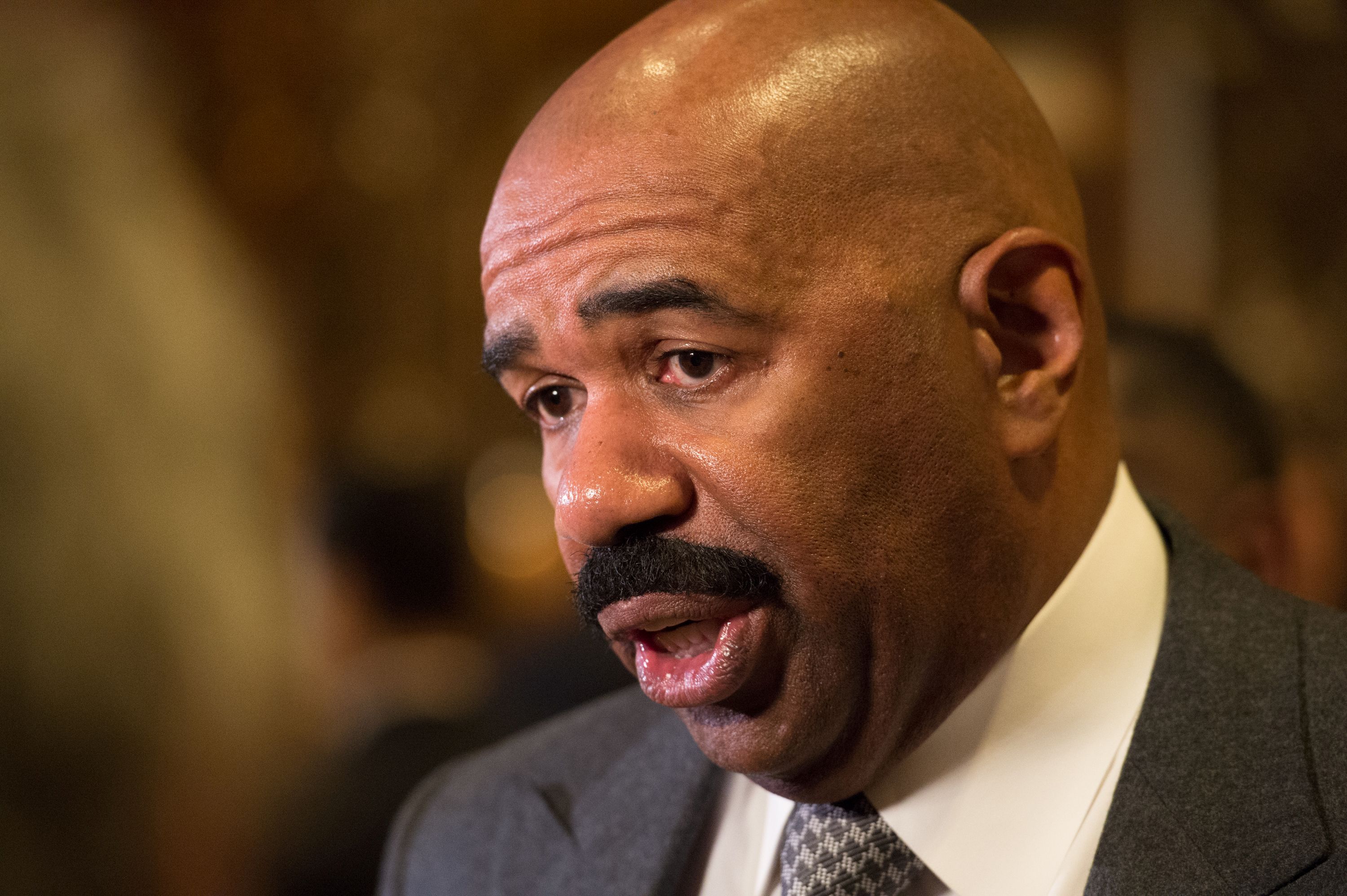 Steve Harvey speaks with the media at Trump Tower on Jan. 13, 2017 in New York. (Bryan R. Smith—AFP/Getty Images)