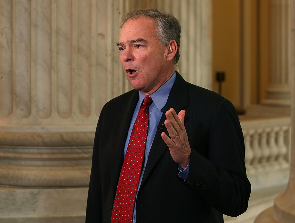 Sen. Tim Kaine (D-VA) speaks on a morning television news show about President Trump's firing yesterday of FBI Director James Comey, on Capitol Hill May 10, 2017 in Washington, DC. (Mark Wilson—Getty Images)