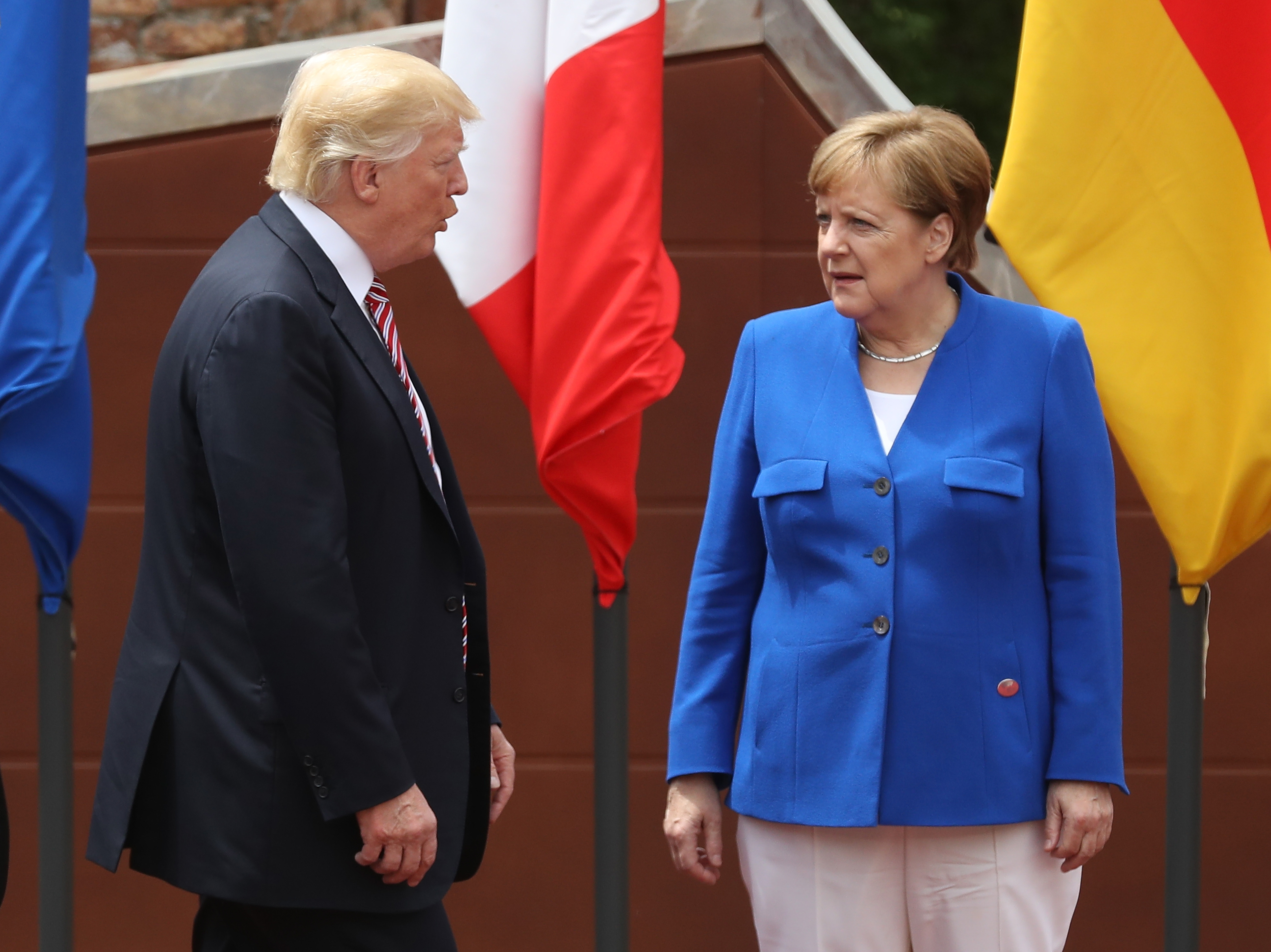 Angela Merkel and Donald Trump at the G7 Taormina summit on the Italian island of Sicily, May 26, 2017. (Sean Gallup—Getty Images)
