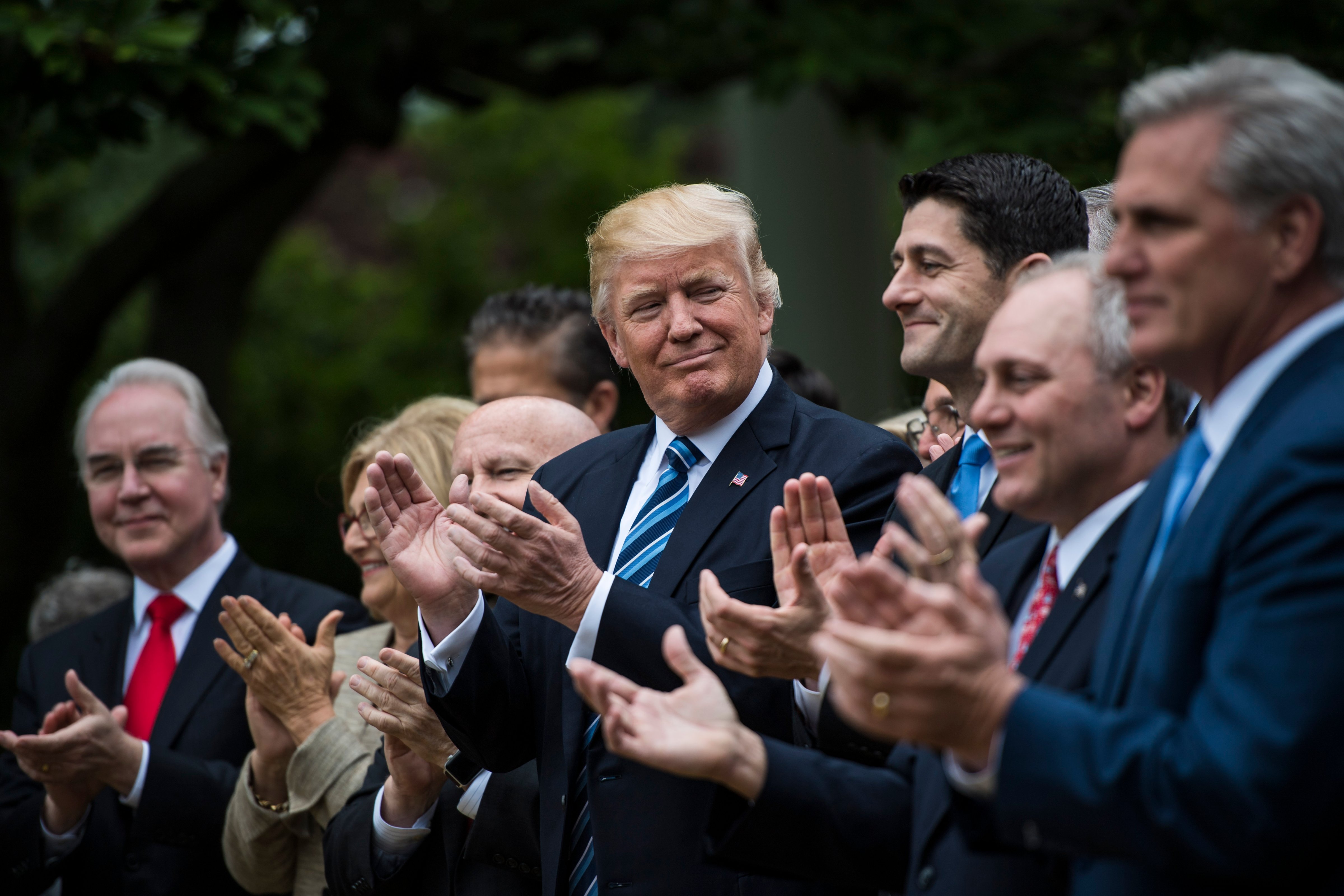 President Donald Trump looks to House Speaker Paul Ryan of Wis., and other House congressmen in the Rose Garden after the House pushed through a health care bill, at the White House in Washington, D.C. on May 04, 2017. (Jabin Botsford—The Washington Post/Getty Images)