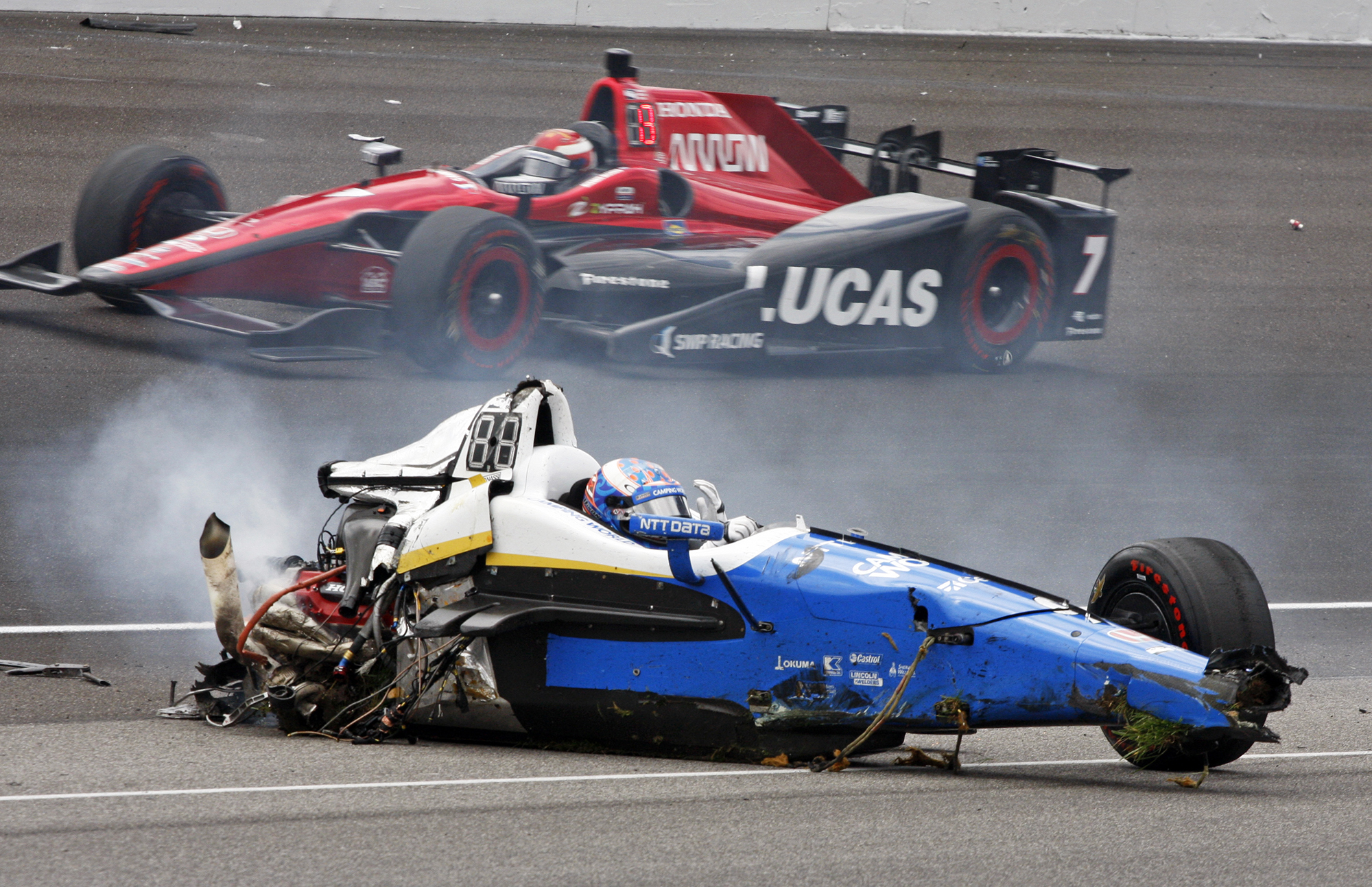 Scott Dixon, of New Zealand, sits in the remains of his car after going airborne in a crash during the running of the Indianapolis 500 auto race at Indianapolis Motor Speedway, on May 28, 2017, in Indianapolis. (Bud Cunningham—AP)
