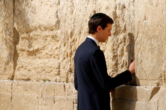 White House senior advisor Jared Kushner leaves a note at the Western Wall in Jerusalem May 22, 2017.