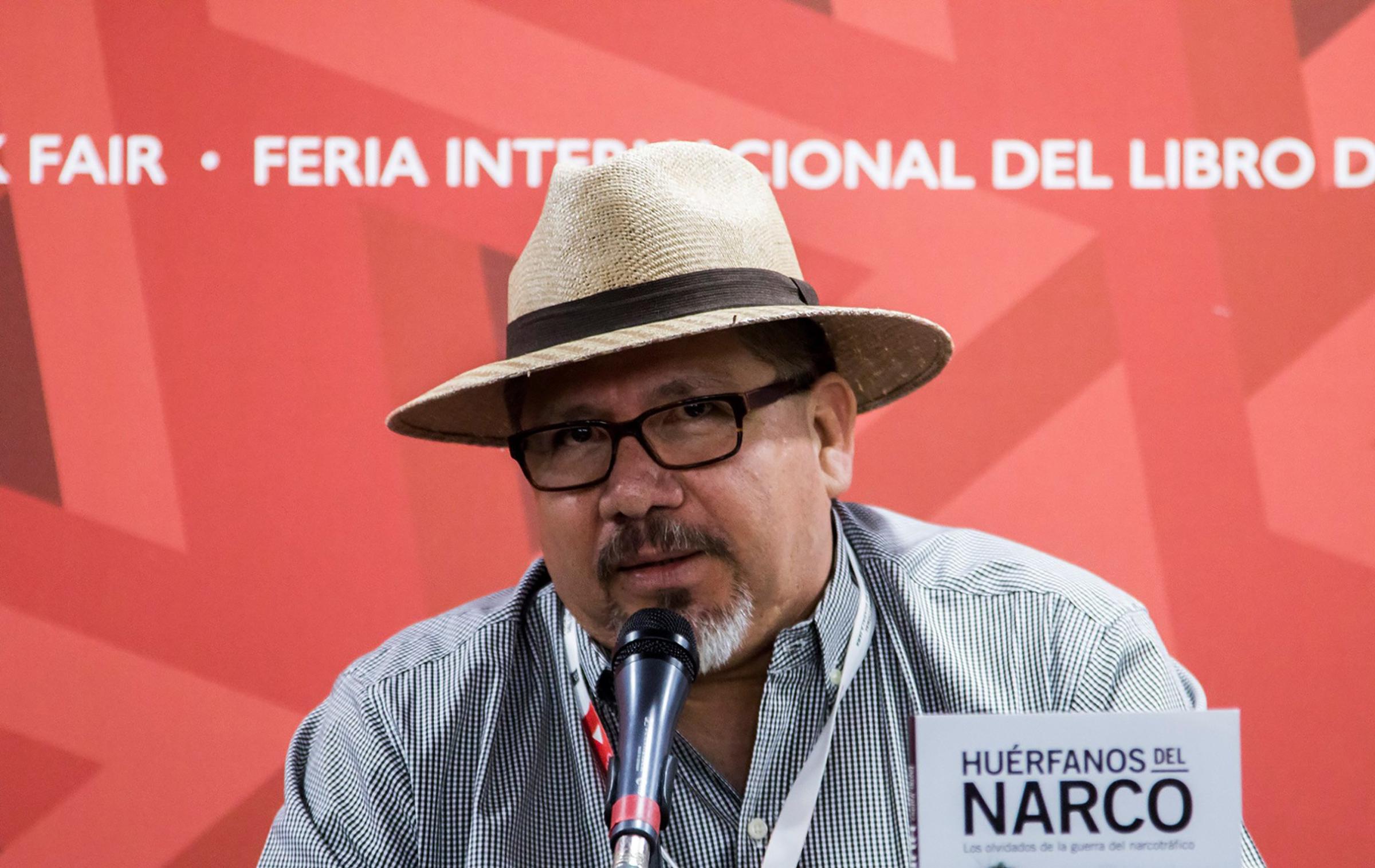 Mexican journalist Javier Valdez speaking during the presentation of his book "Huerfanos del Narco" in the framework of the International Book Fair in Guadalajara, Mexico on Nov. 27, 2016.
