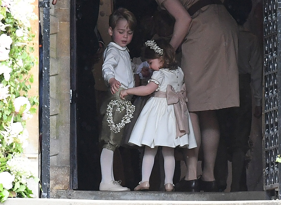 ENGLEFIELD GREEN, ENGLAND - MAY 20:  Prince George of Cambridge, paige boy and Princess Charlotte of Cambridge, bridesmaid attend the wedding of Pippa Middleton and James Matthews at St Mark's Church on May 20, 2017 in Englefield Green, England.  (Photo by Samir Hussein/Samir Hussein/WireImage) (Samir Hussein&mdash;Samir Hussein/WireImage)