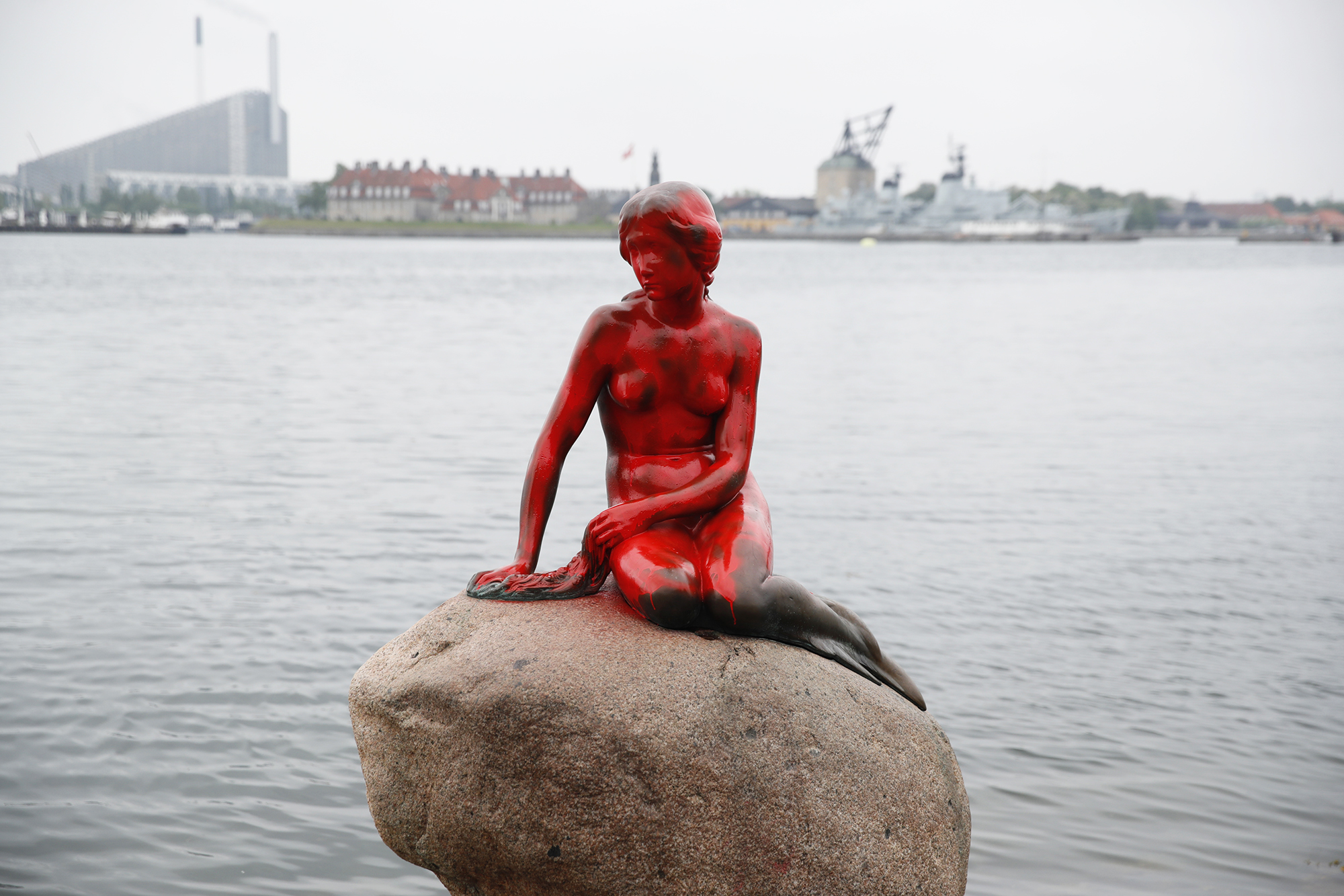 Red paint covers the vandalized tourist attraction The Little Mermaid in Copenhagen, on May 30 2017. (Jens Dresling—AP)