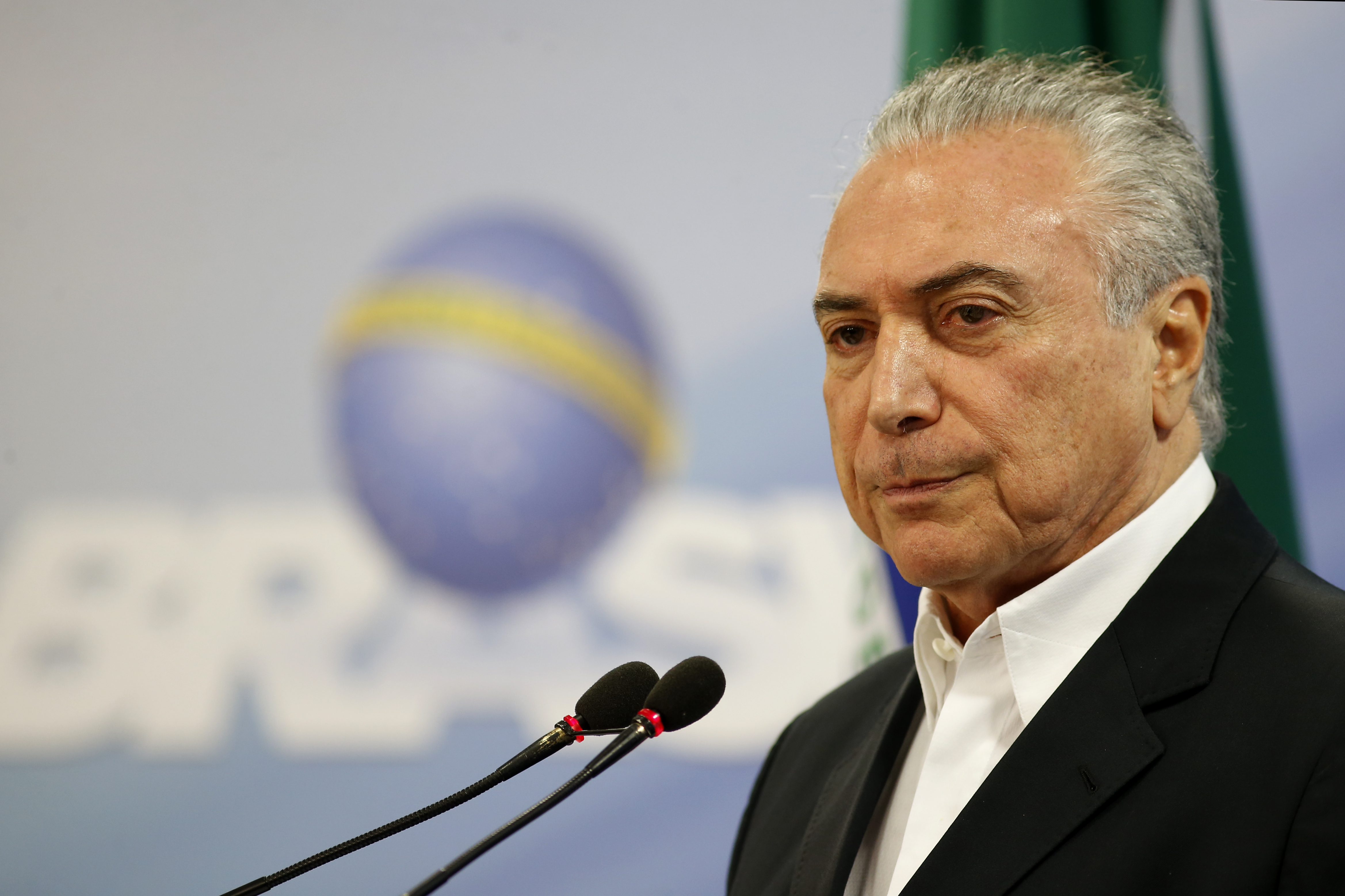 Michel Temer delivers a new statement following the release of a tape allegedly demonstrating him condoning bribery payments to Chamber of Deputies President Eduardo Cunha on May 20, 2017 in Brasilia, Brazil. (Igo Estrela—Getty Images)