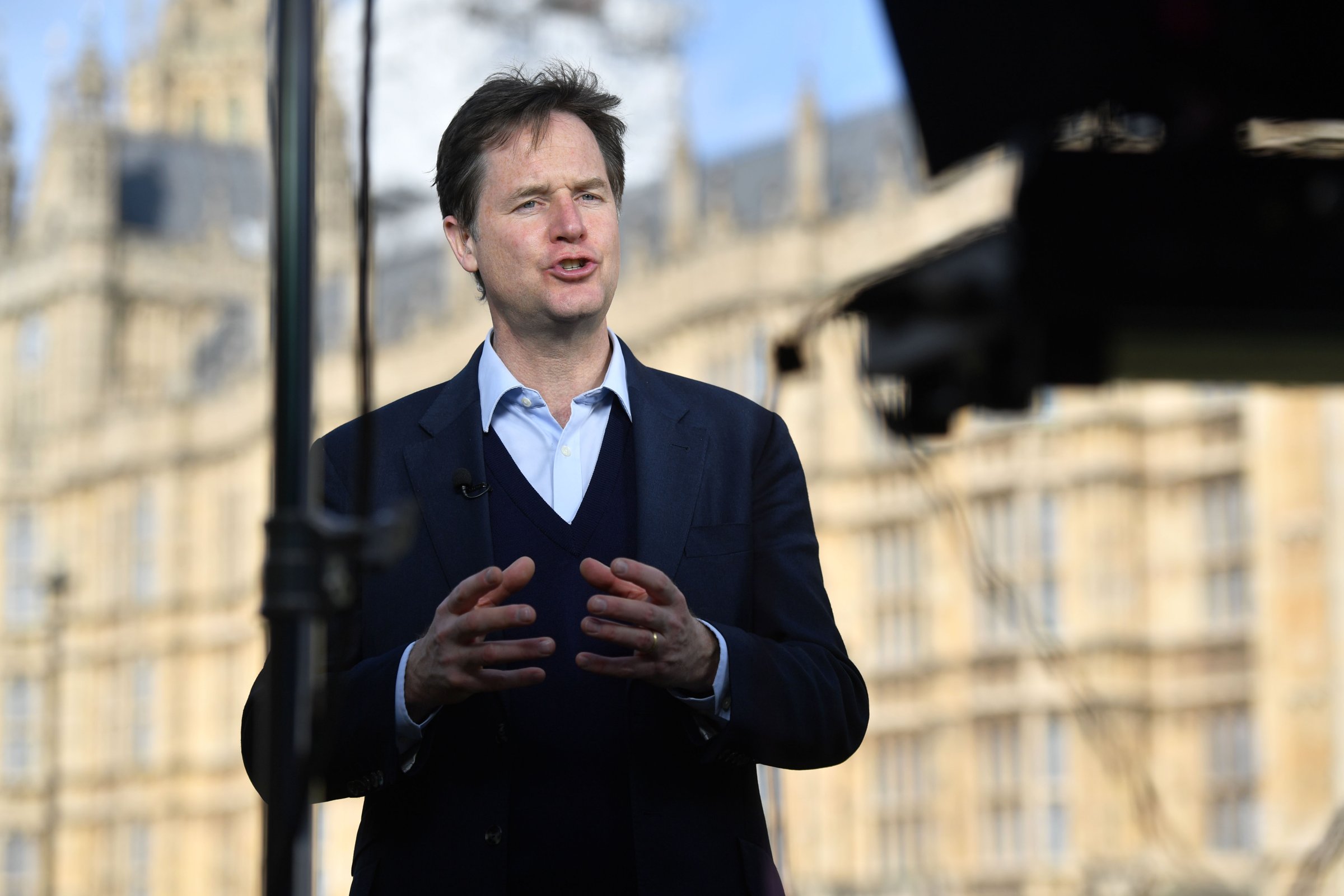 British Liberal Democrat politician, Nick Clegg chats to the media outside the Houses of Parliament in London on April 19, 2017.