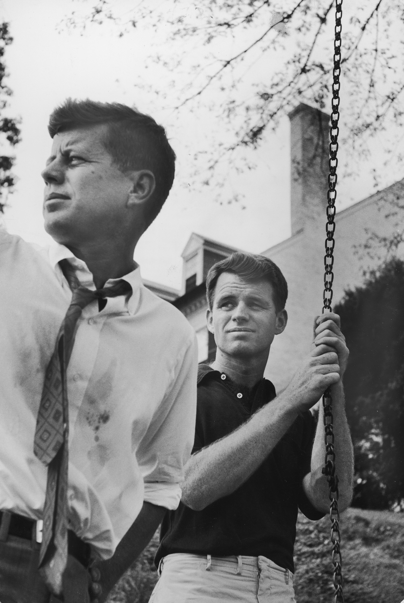 Sen. John Kennedy with his brother at Robert Kennedy's home in McLean, Va., May 1957.