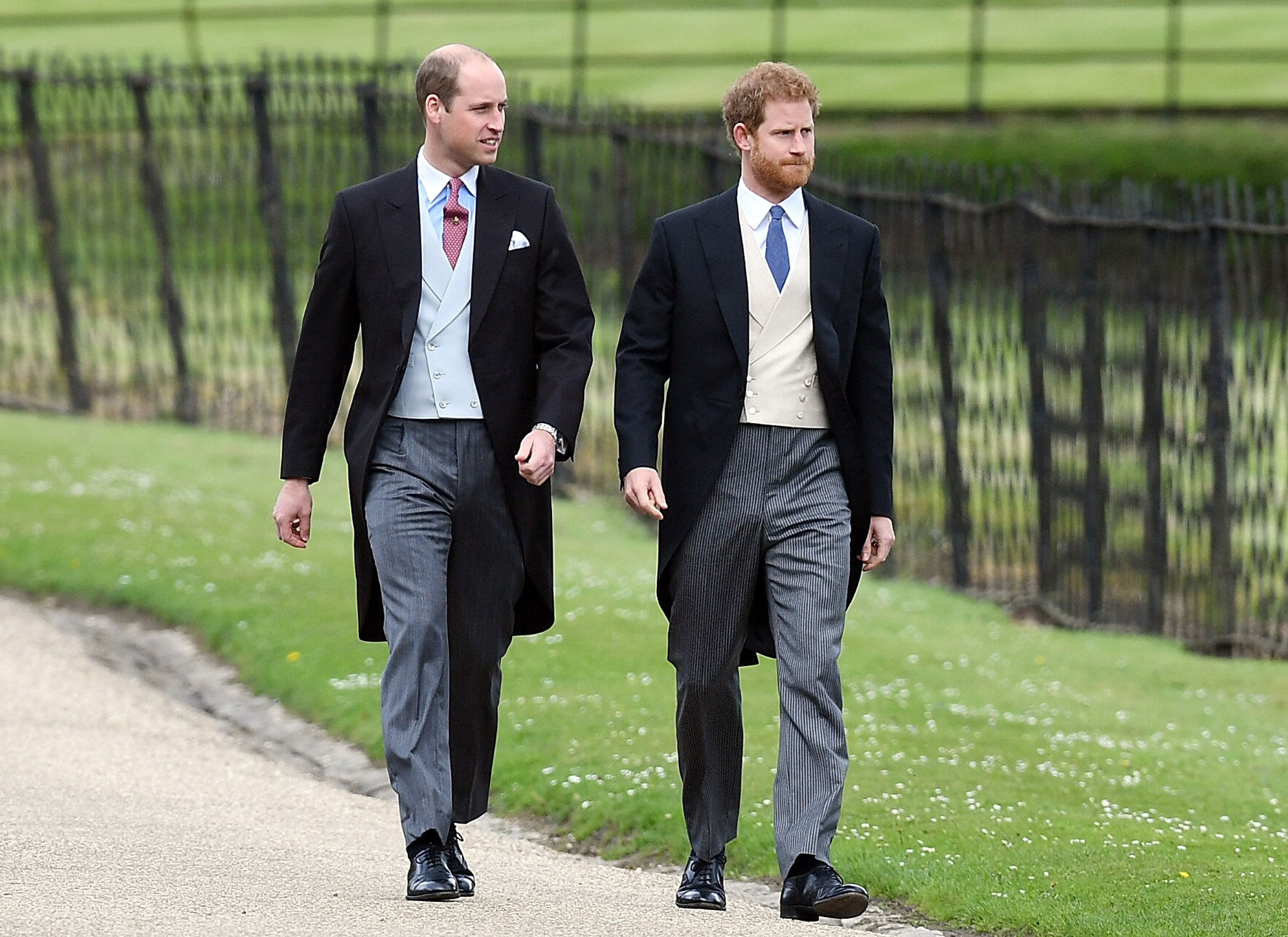Prince William, Duke of Cambridge and Prince Harry attend the wedding of Pippa Middleton and James Matthews at St Mark's Church on May 20, 2017 in Englefield Green, England.