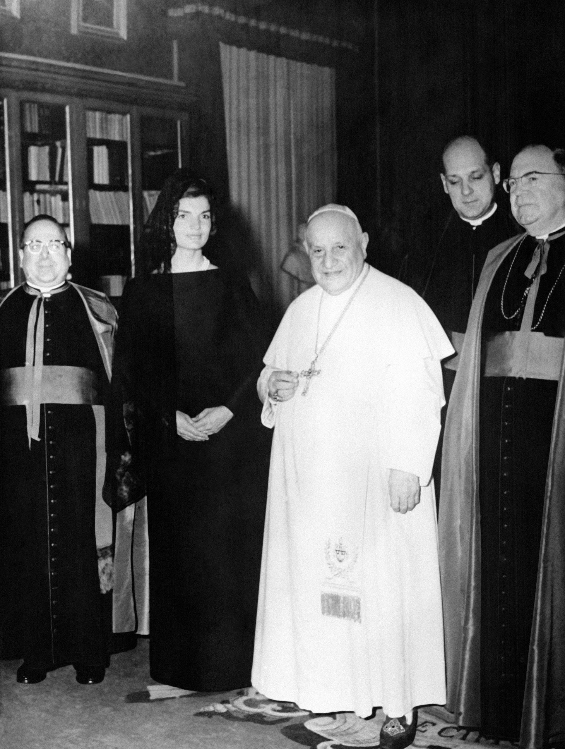 Jacqueline Kennedy stands next to Pope John XXIII during an audience in the Pontiff's private library in the Vatican, Italy, March 11, 1962.