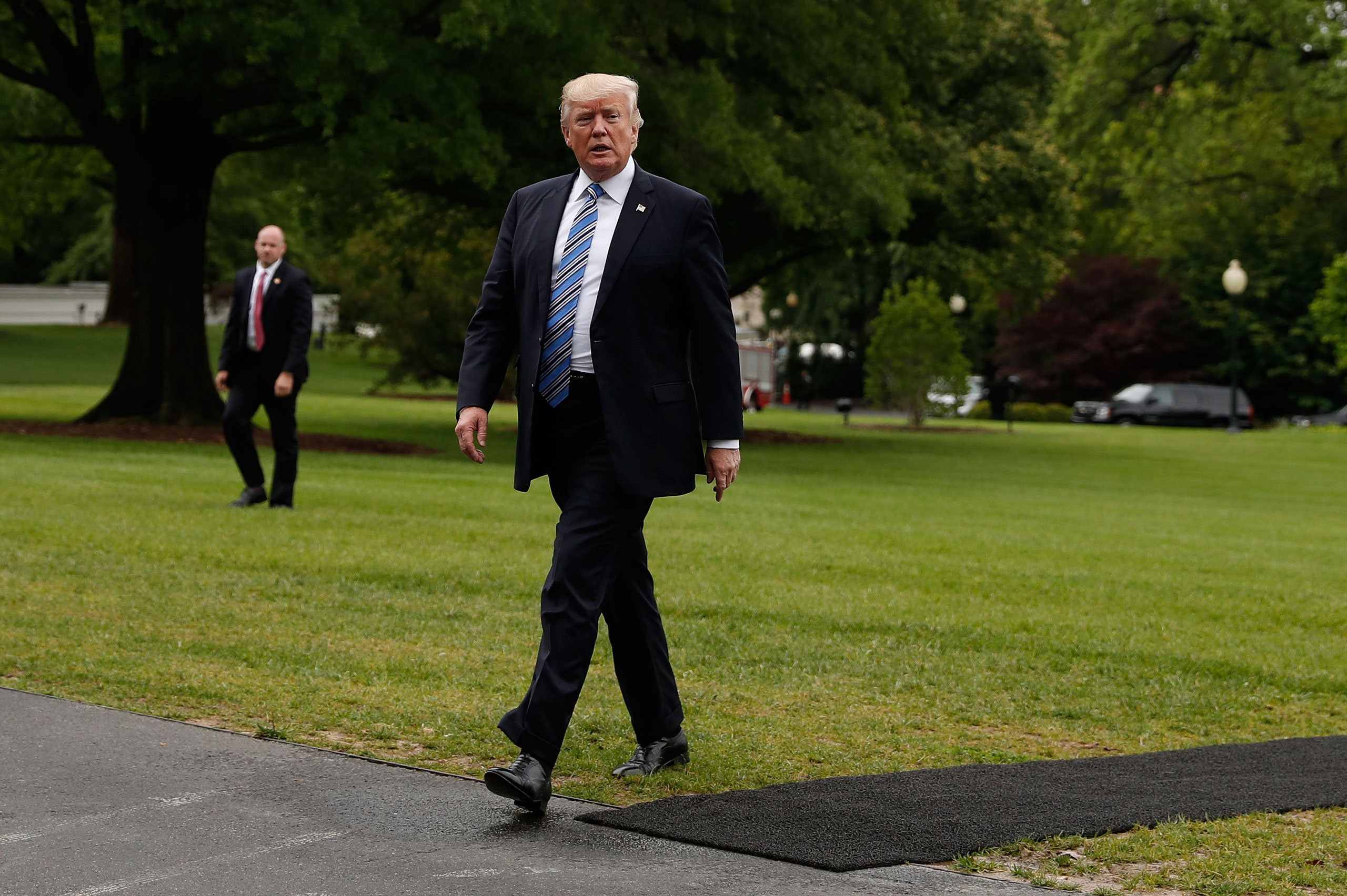 President Donald Trump arrives on Marine One on the South Lawn of the White House in Washington, Saturday, May 13, 2017, as he returns from speaking in Lynchburg, Va., at the Liberty University Commencement ceremony. (Carolyn Kaster—AP)