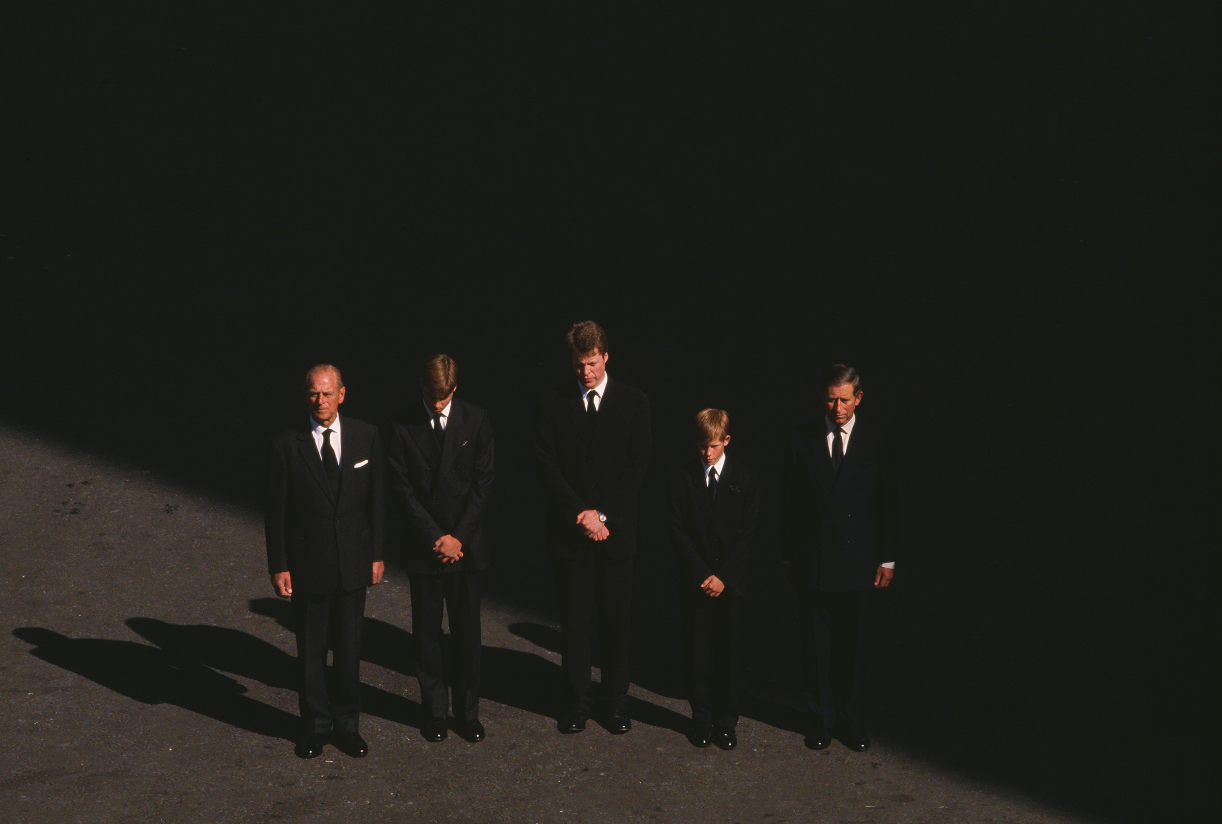 Prince Philip stands with Prince William, Earl Charles Spencer, Prince Harry and Prince Charles at the funeral of Princess Diana, on Sept. 6, 1997. (Robert Wallis—Corbis/Getty Images)