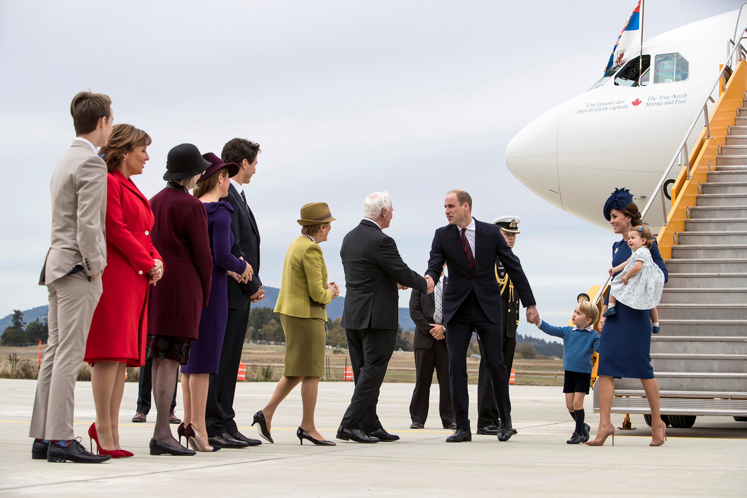 Britain's Prince William, Catherine, Duchess of Cambridge, Prince George and Princess Charlotte arrive at the Victoria International Airport for the start of their eight-day royal tour to Canada in Victoria, British Columbia, on Sept. 24, 2016.