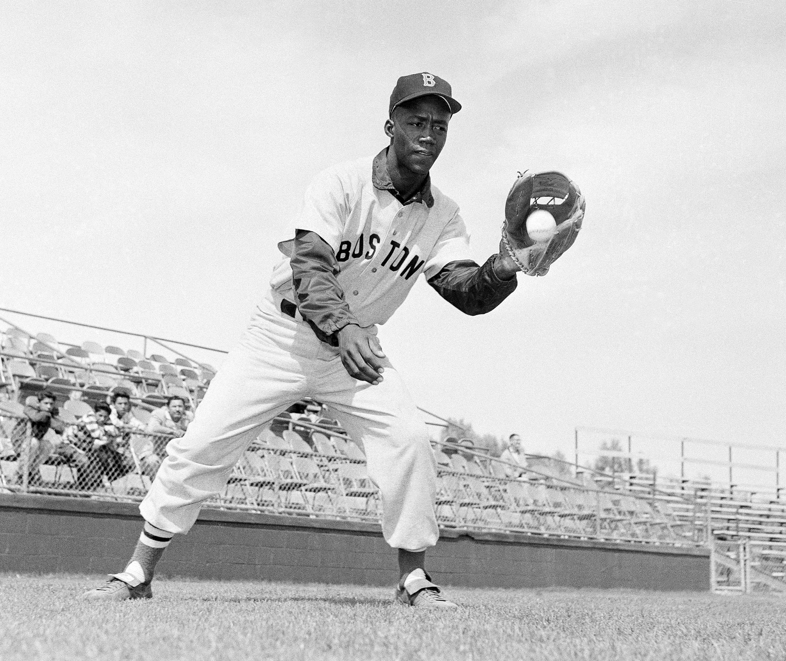 Elijah "Pumpsie" Green, of the Boston Red Sox, shown in action, April 20, 1959. Green was the first black player on the Red Sox. (Harold Filan—AP Photo)