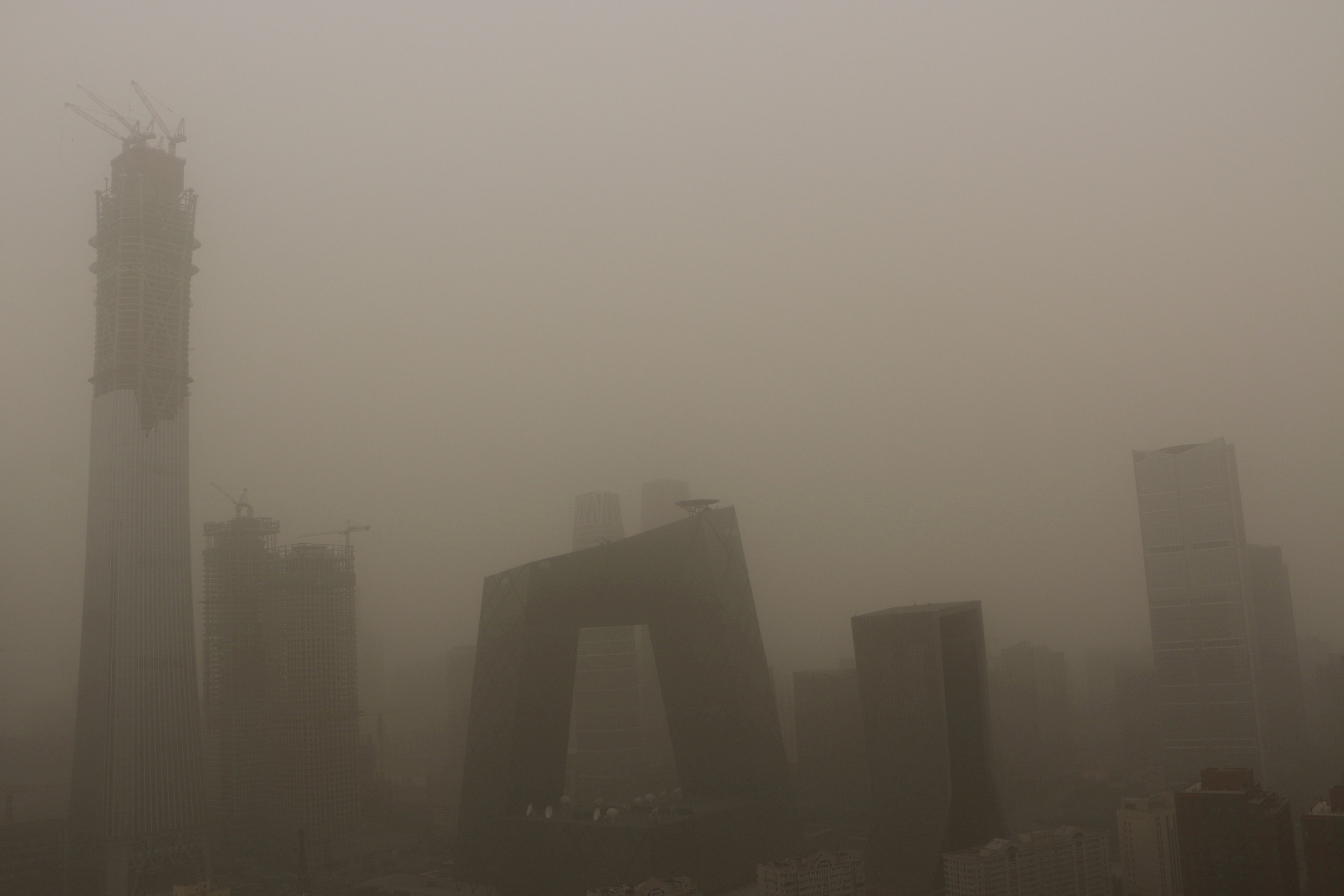 Buildings are seen during a dust storm in Beijing