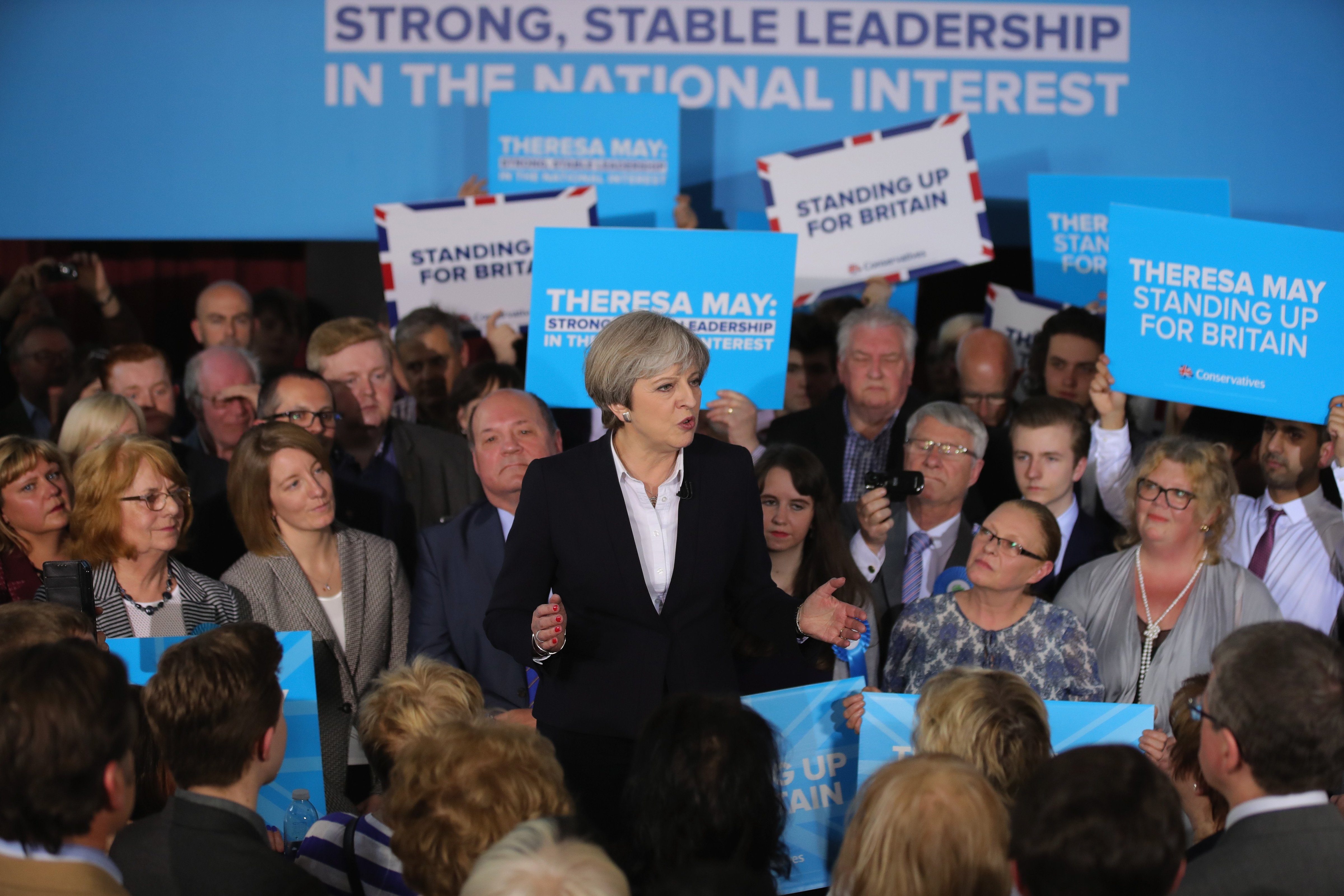 British Prime Minister Theresa May addresses supporters at an election campaign rally on May 1, 2017 in Mawdesley Village Hall near Ormskirk, England. (Christopher Furlong—Getty Images)