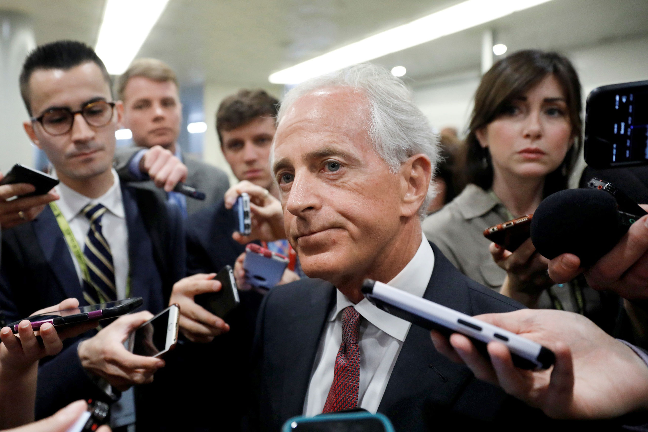 Republican Senator Bob Corker, surrounded by reporters on May 16, sharply criticized a White House in growing disarray (Aaron P. Bernstein—Reuters)