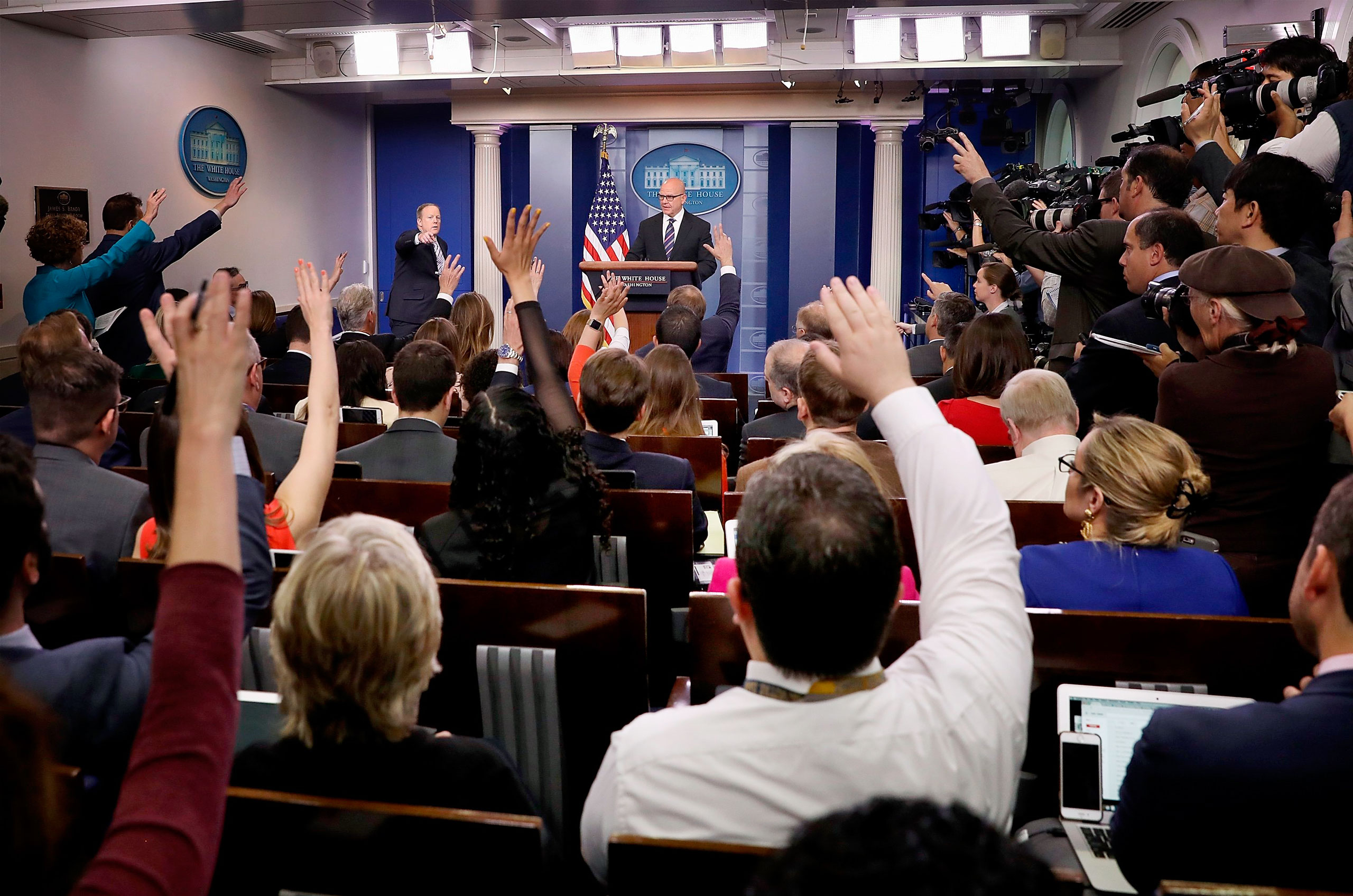 McMaster at the briefing-room podium, defending Trump’s decision to share intelligence with Russia (Win McNamee—Getty Images)