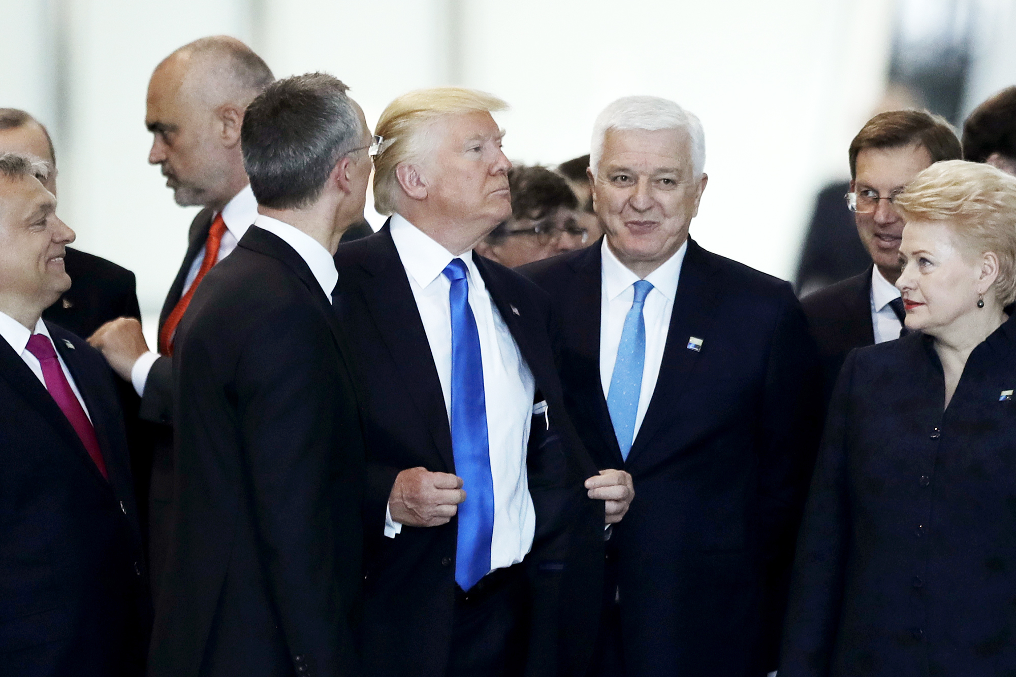 Montenegro Prime Minister Dusko Markovic, center right, after appearing to be pushed by Donald Trump, center, during a NATO summit of heads of state and government in Brussels, on May 25, 2017. (Matt Dunham—AP)