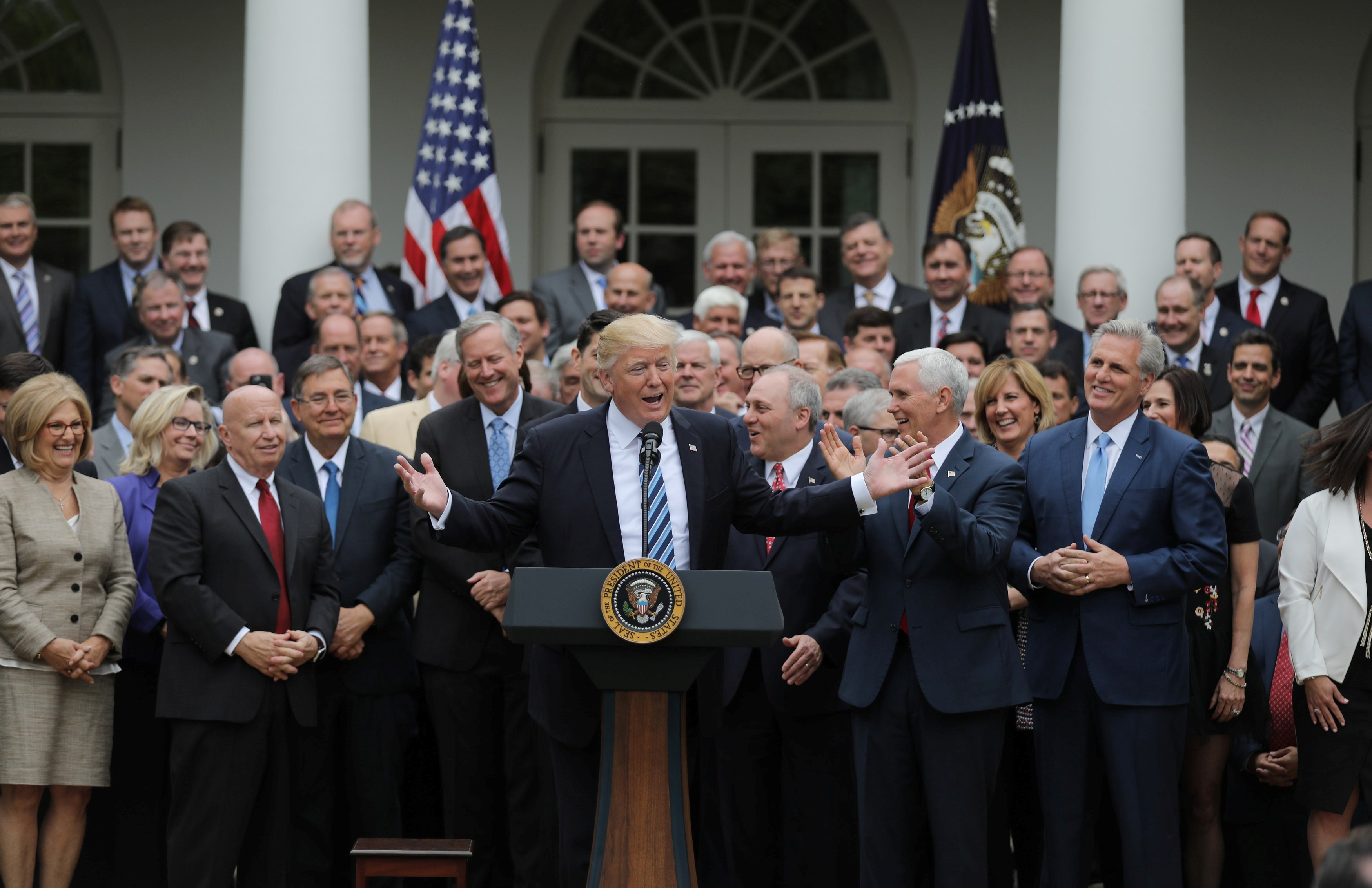 President Donald Trump gathers with Congressional Republicans in the Rose Garden of the White House after the House of Representatives approved the American Healthcare Act, to repeal major parts of Obamacare and replace it with the Republican healthcare plan, in Washington, May 4, 2017. (Carlos Barria&mdash;Reuters)
