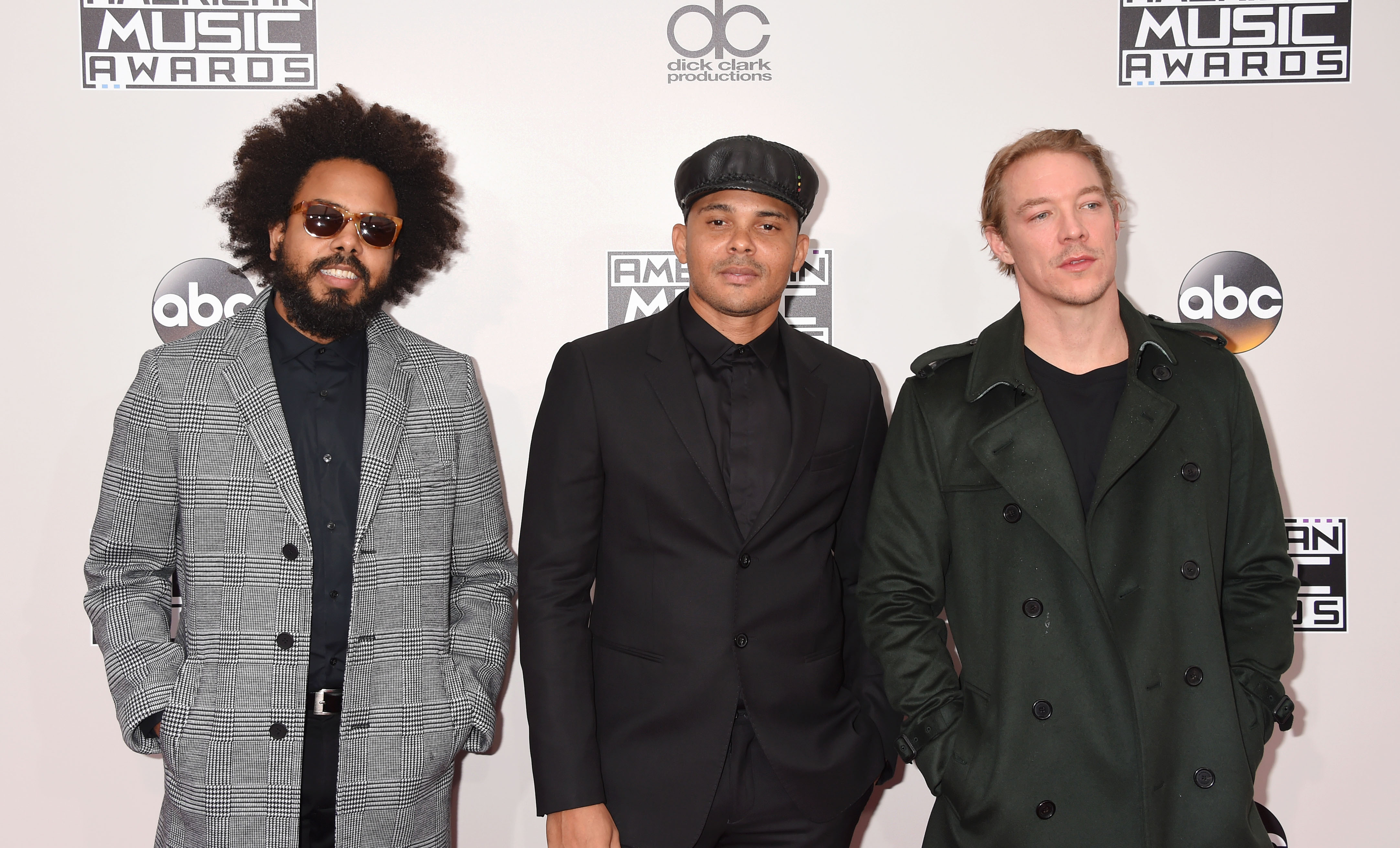 (L-R) Jillionaire, Walshy Fire and Diplo of Major Lazer arrive at the 2016 American Music Awards at Microsoft Theater on November 20, 2016 in Los Angeles, California. (Jeffrey Mayer—WireImage/Getty Images)