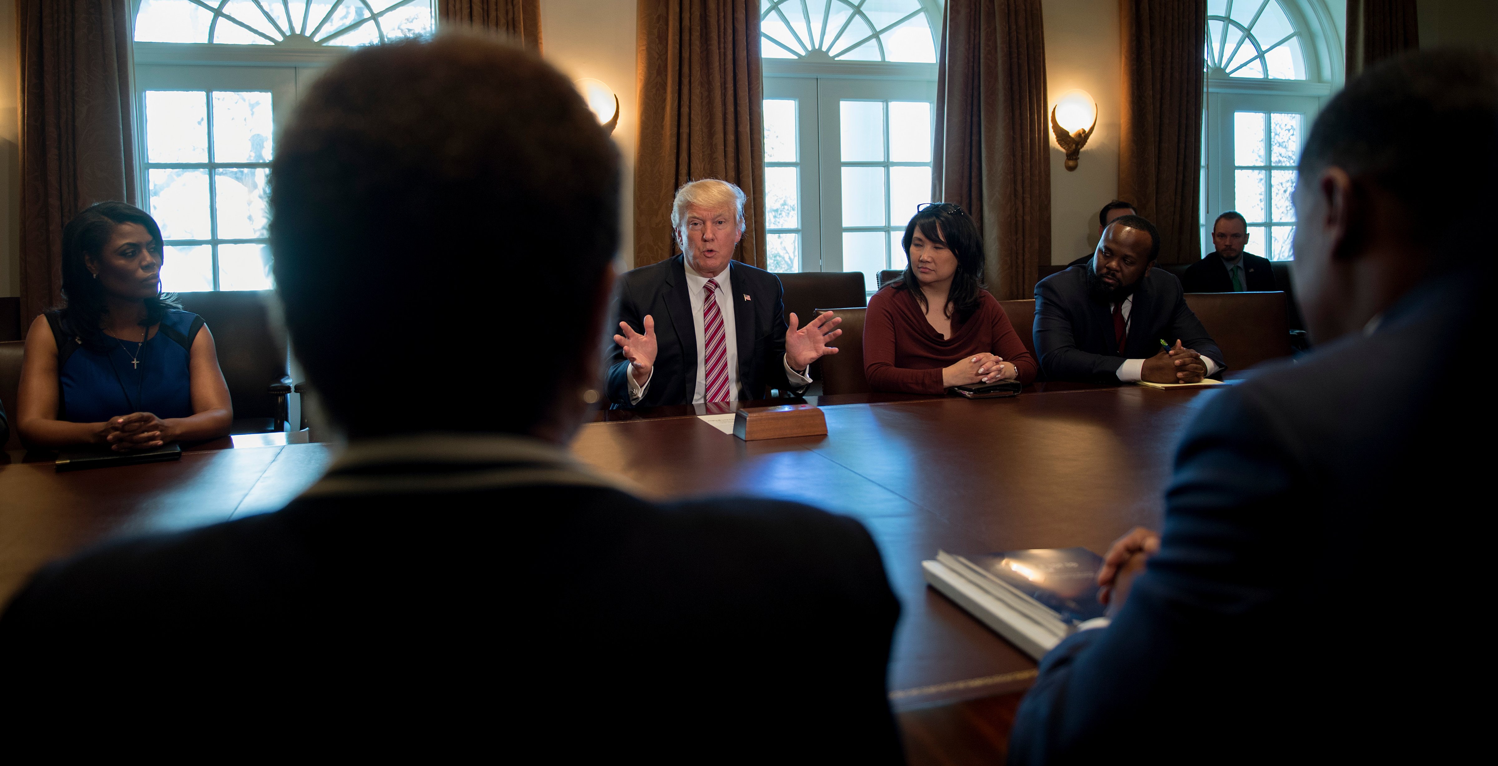 US President Donald Trump (C) meets with the Congressional Black Caucus Executive Committee at the White House in Washington, DC, March 22, 2017 (JIM WATSON—AFP/Getty Images)