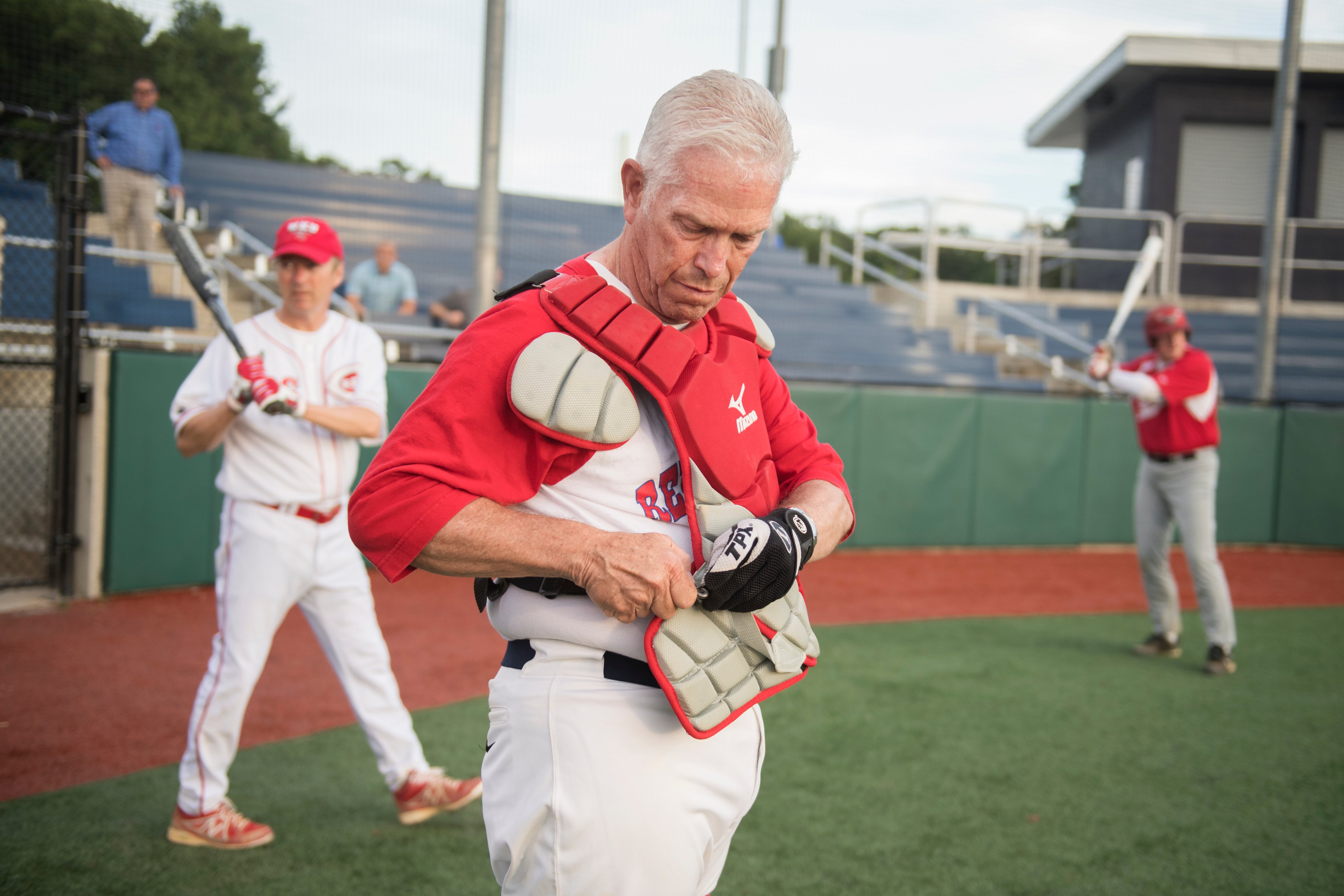 UNITED STATES - JUNE 13: Rep. Bill Johnson, R-Ohio, puts on catcher's gear during a scrimmage between Republican team members at the Washington Nationals Youth Baseball Academy in Anacostia, June 13, 2016. (Tom Williams—CQ-Roll Call,Inc.)