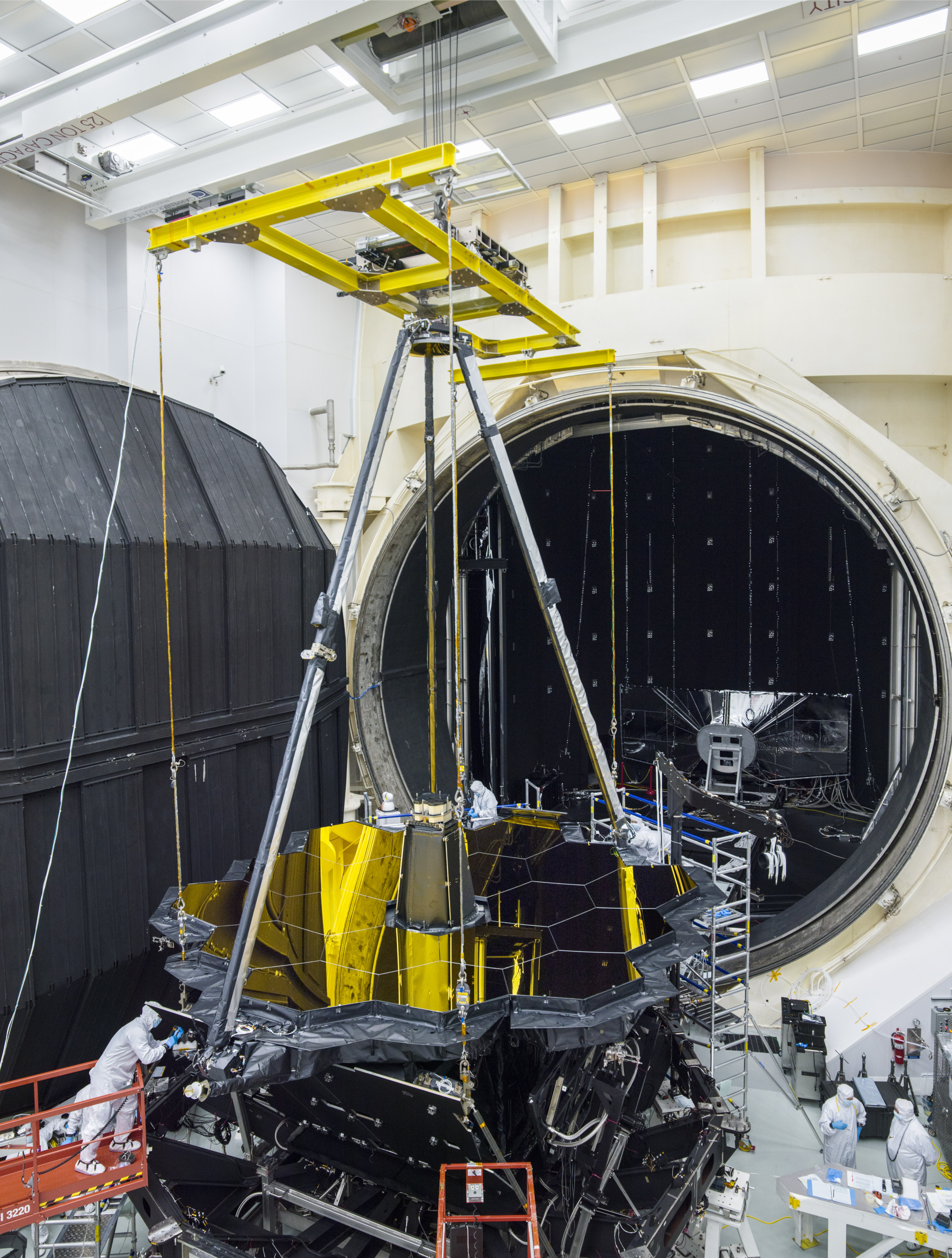 The James Webb Space Telescope for testing being placed in a thermal vacuum chamber. (NASA)