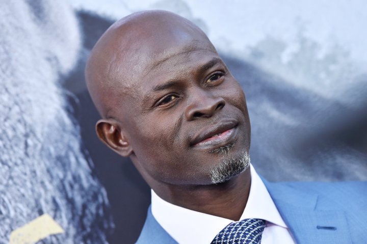 HOLLYWOOD, CA - MAY 08: Actor Djimon Hounsou arrives at the premiere of Warner Bros. Pictures' 'King Arthur: Legend of the Sword' at TCL Chinese Theatre on May 8, 2017 in Hollywood, California. (Photo by Axelle/Bauer-Griffin/FilmMagic)