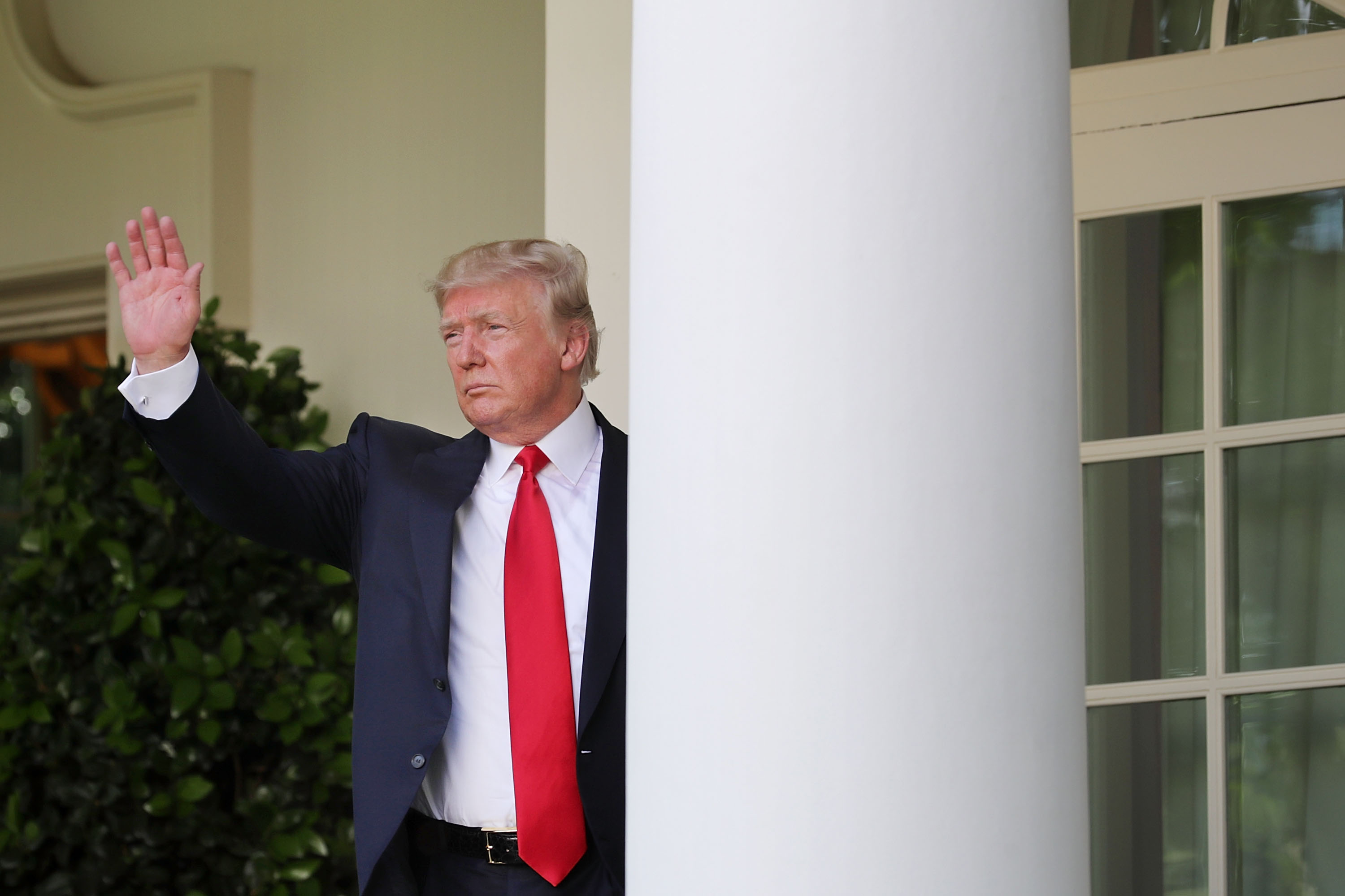 President Donald Trump waves goodbye after announcing his decision to pull the United States out of the Paris climate agreement in the Rose Garden at the White House June 1, 2017 in Washington, D.C. (Chip Somodevilla&mdash;Getty Images)