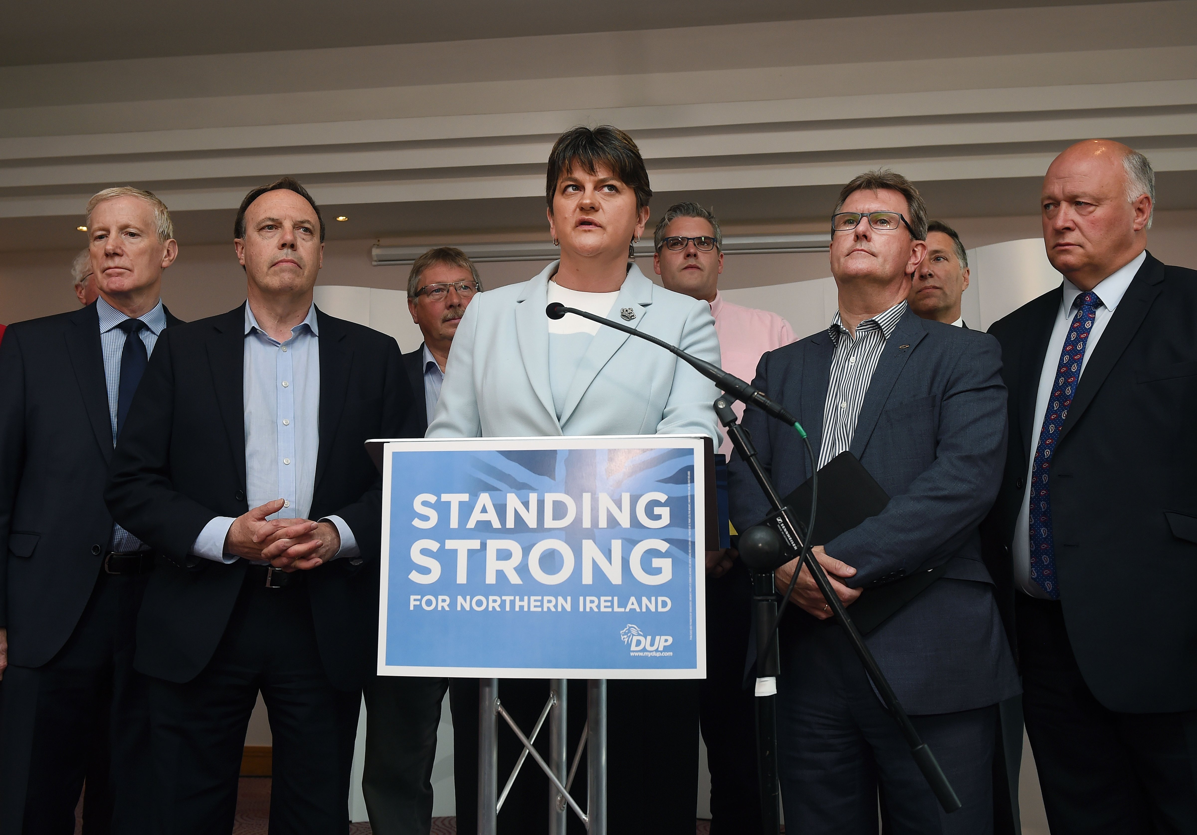 DUP leader and Northern Ireland former First Minister Arlene Foster (C) holds a brief press conference with the DUP's newly elected Westminster candidates who stood in the general election on June 9, 2017 in Belfast, Northern Ireland.