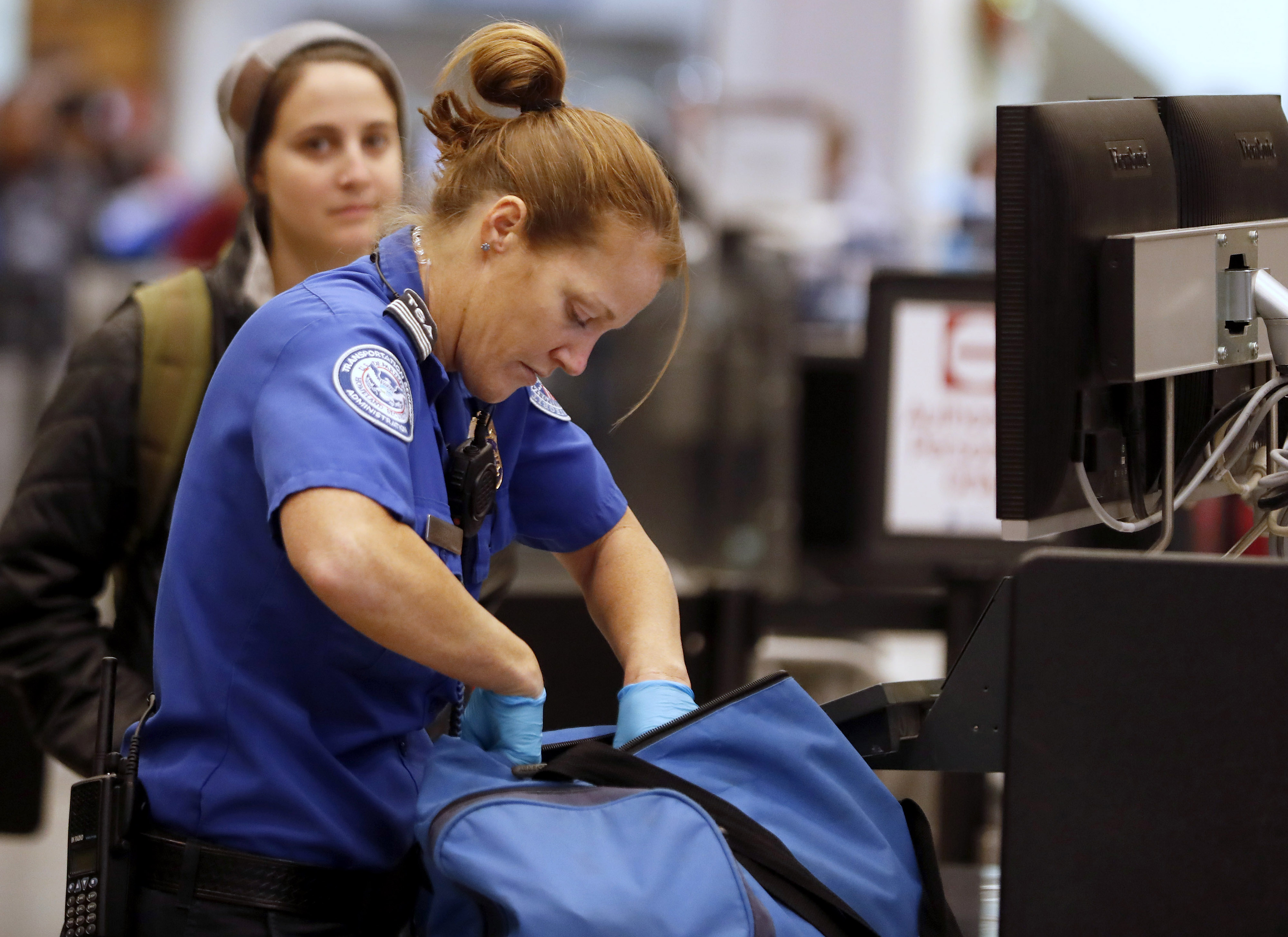 Travelers At Salt Lake City International Airport Ahead Of Holiday Weekend