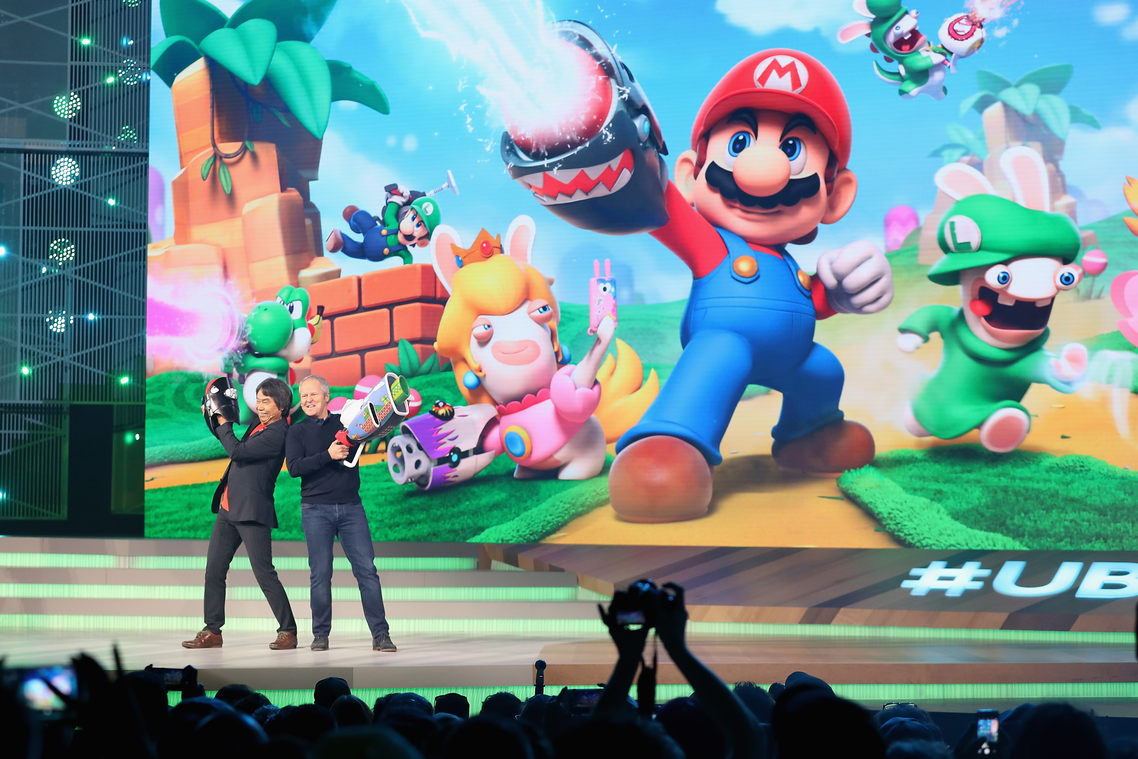 Nintendo co-Representative Director and Creative Fellow Shigeru Miyamoto (L) and Ubisoft Co-founder and CEO Yves Guillemot pose together on stage during the Ubisoft E3 conference at the Orpheum Theater on June 12, 2017 in Los Angeles, California. (Christian Petersen&mdash;Getty Images)