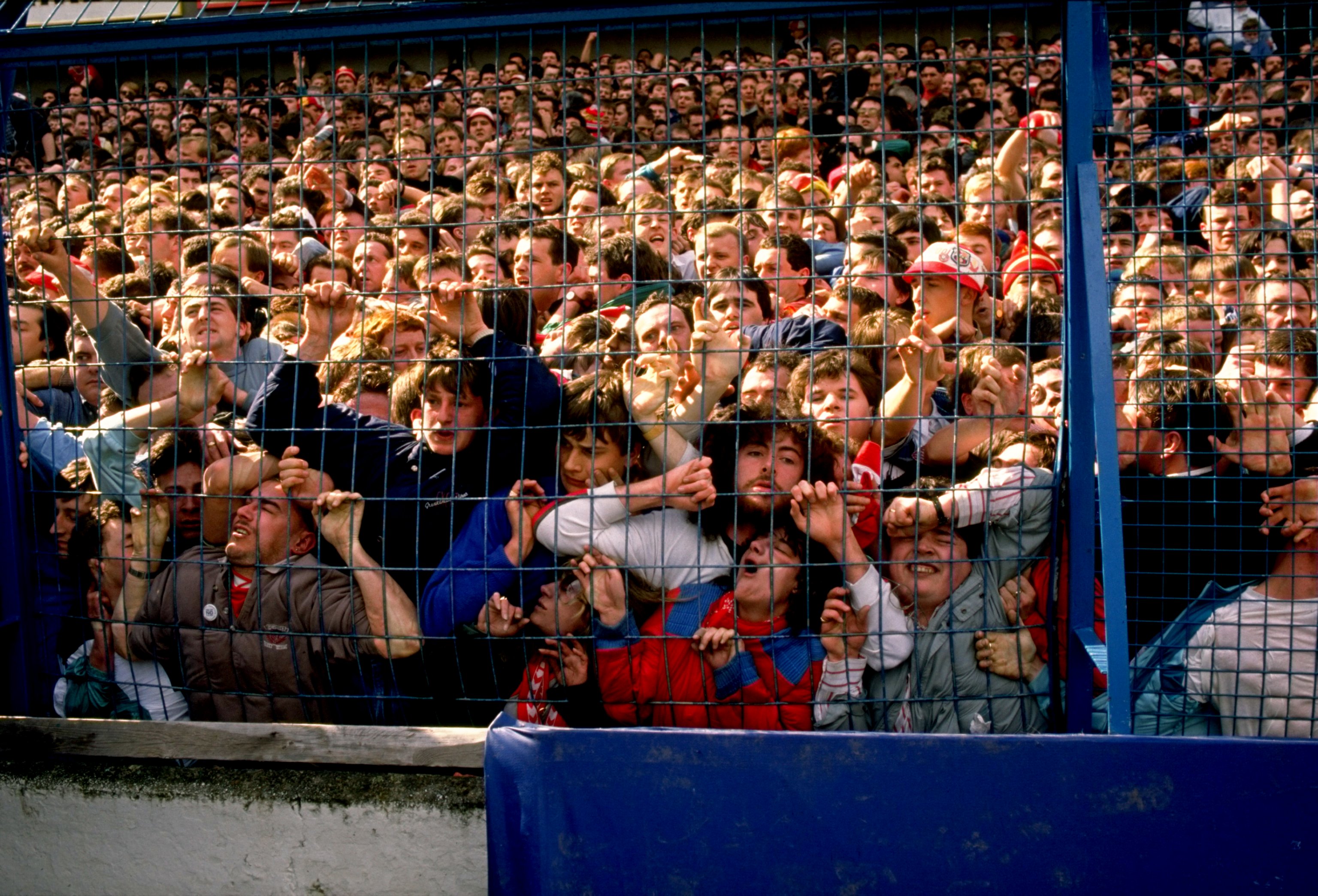 Apr 1989:  Supporters are crushed against the barrier as disaster strikes before the FA Cup semi-final match between Liverpool and Nottingham Forest played at the Hillsborough Stadium in Sheffield, England. (David Cannon&mdash;Getty Images)