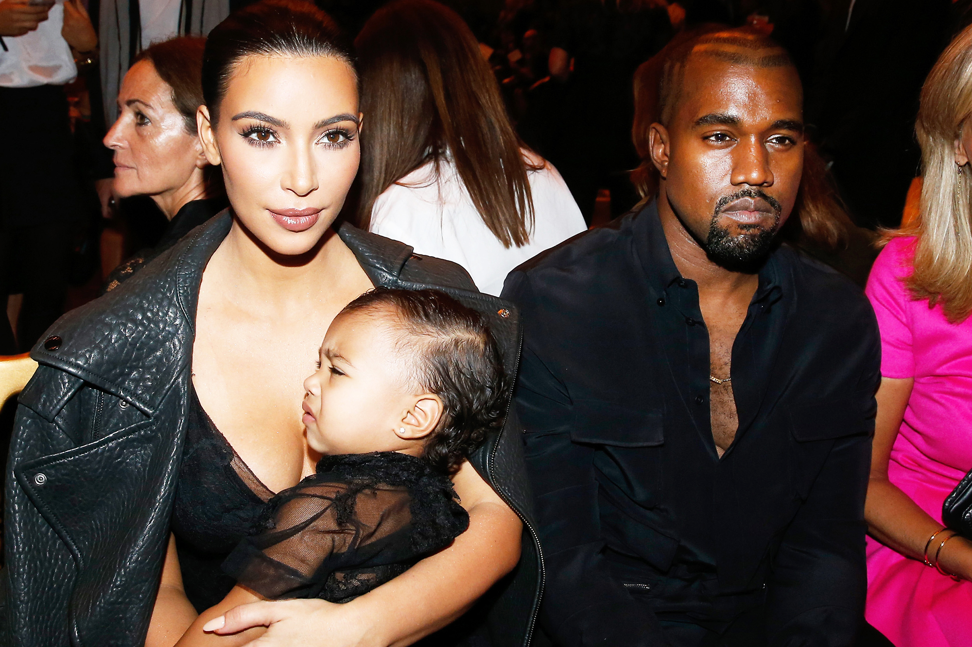 Kim Kardashian, Kanye West and North West attend the Givenchy show as part of the Paris Fashion Week Womenswear Spring/Summer 2015 in Paris, on Sept. 28, 2014.