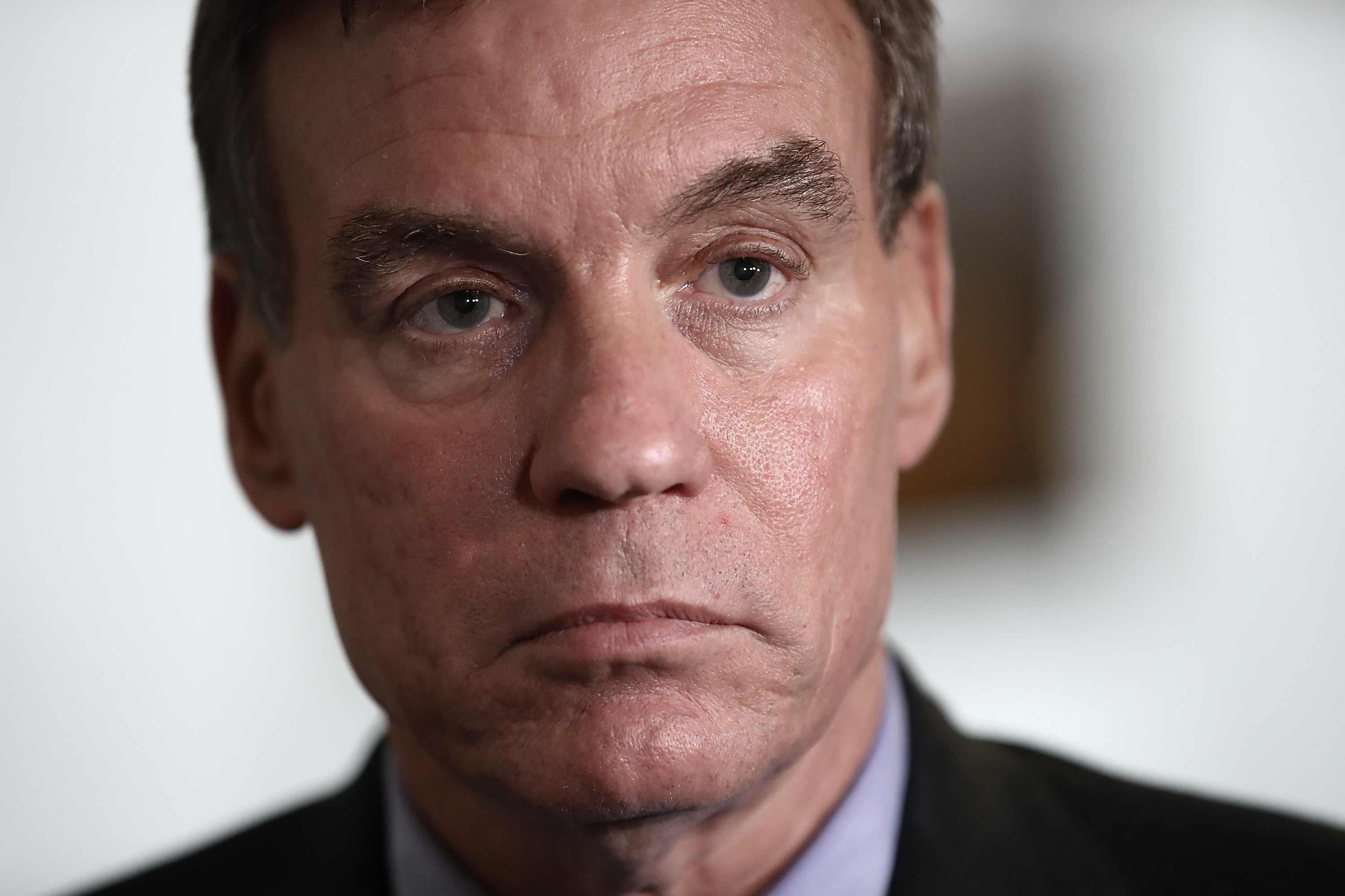 Senate Select Committee on Intelligence ranking member Mark Warner (D-VA) speaks to reporters after a meeting of the committee on Capitol Hill May 23, 2017 in Washington, DC. (Win McNamee—Getty Images)