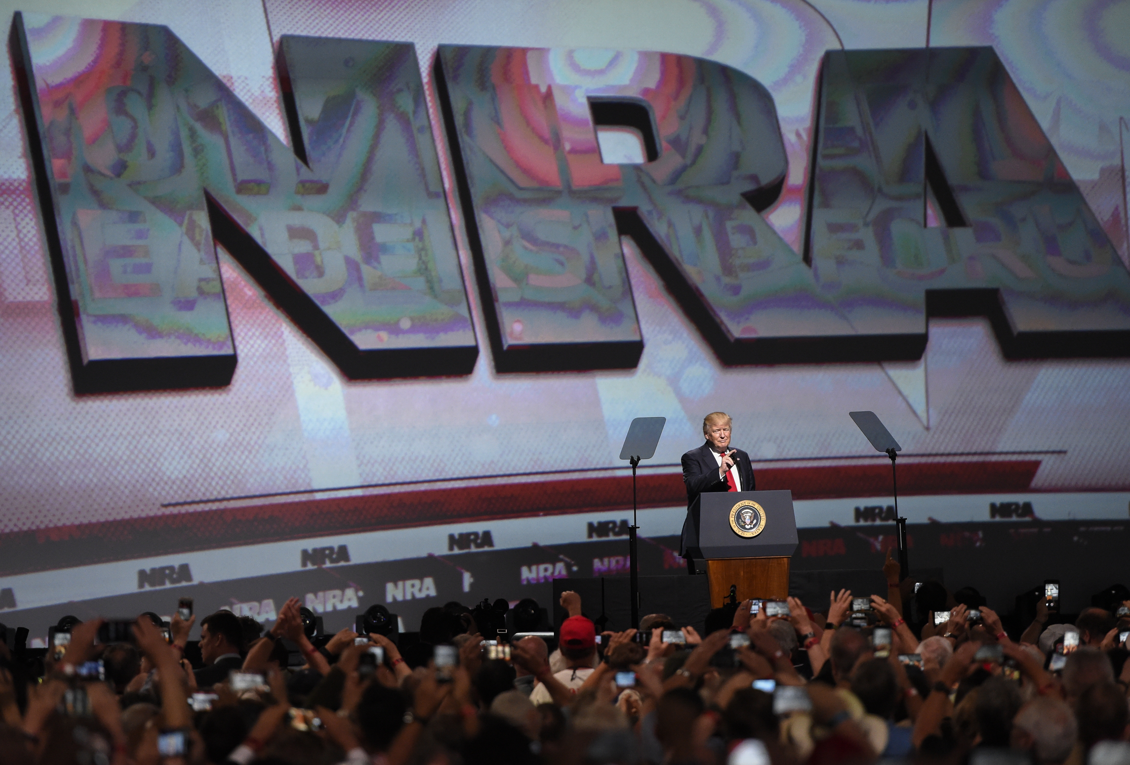 President Donald Trump speaks during the National Rifle Association-ILA Leadership Forum, April 28, 2017, in Atlanta. The NRA is holding its 146th annual meetings and exhibits forum at the Georgia World Congress Center. (Mike Stewart—AP)