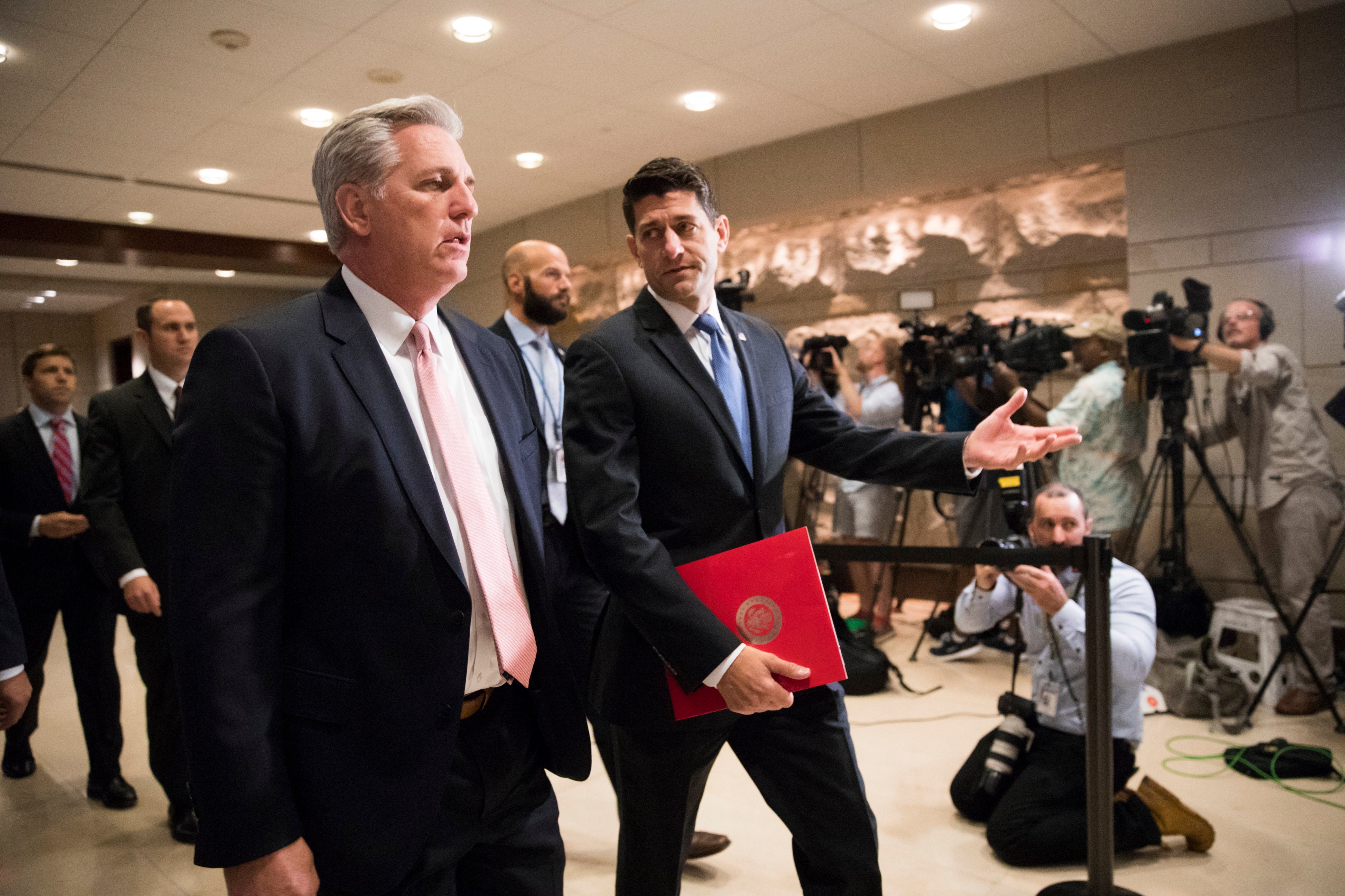 House Speaker Paul Ryan of Wis., right, and House Majority Leader Kevin McCarthy of Calif. walk to a security briefing for lawmakers on Capitol Hill in Washington on June 14, 2017, after a gunman opened fire wounding House Majority Whip Rep. Steve Scalise of La., and others during a Congressional baseball practice in Alexandria, Va. (J. Scott Applewhite&mdash;AP)