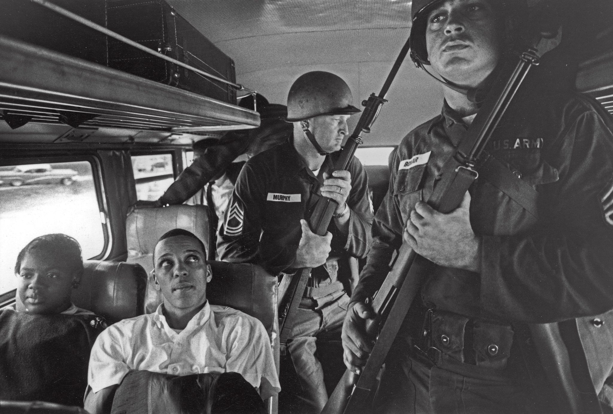 Julia Aaron and David Dennis with 25 other freedom riders are escorted by Mississippi National Guardsmen travelling from Montgomery, Ala. to Jackson, Miss., May 1961.