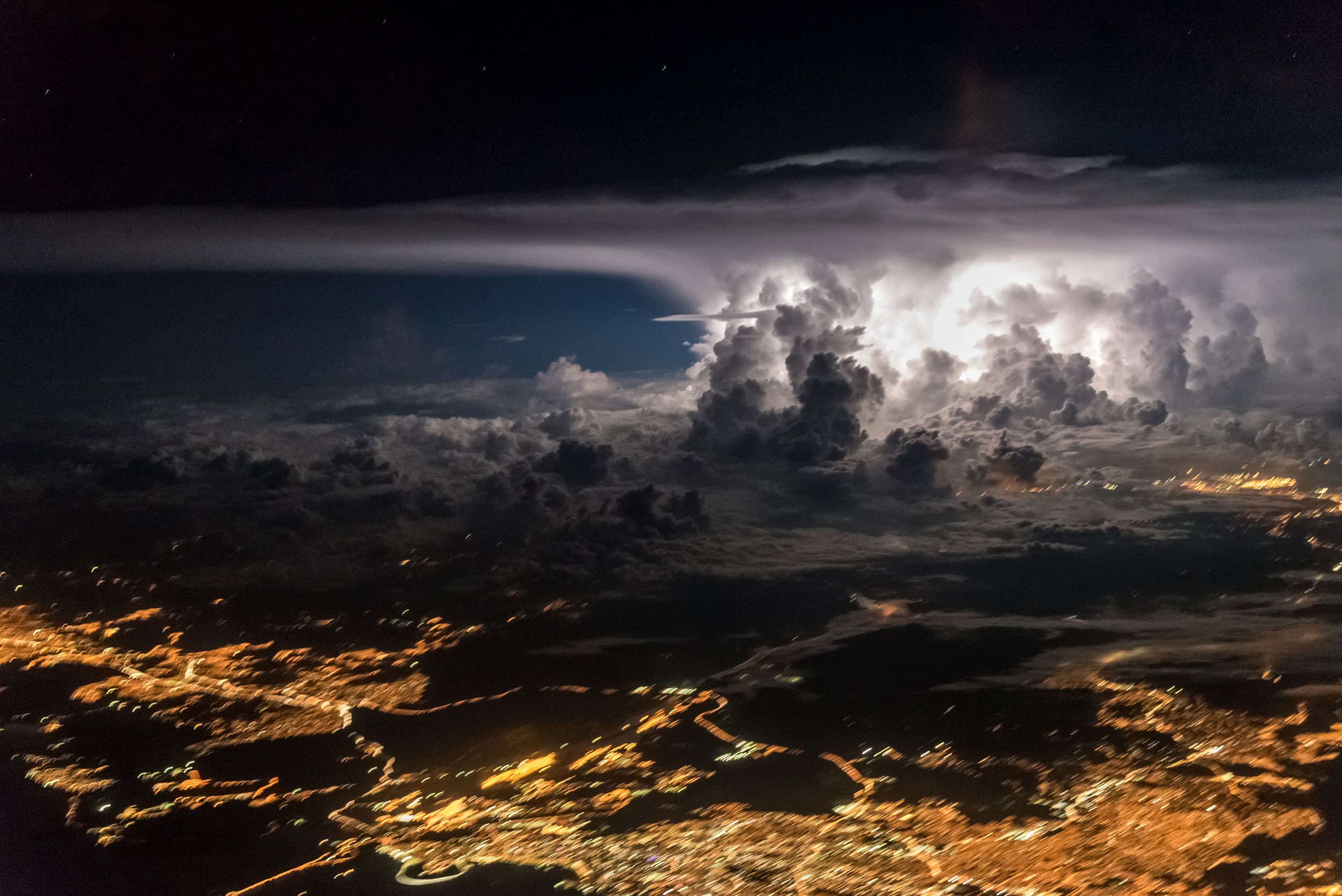 A strong supercell is flashing near the coast of Panama City where both Pacific and Atlantic oceans meet and create the perfect scenario for storms. (Santiago Borja)