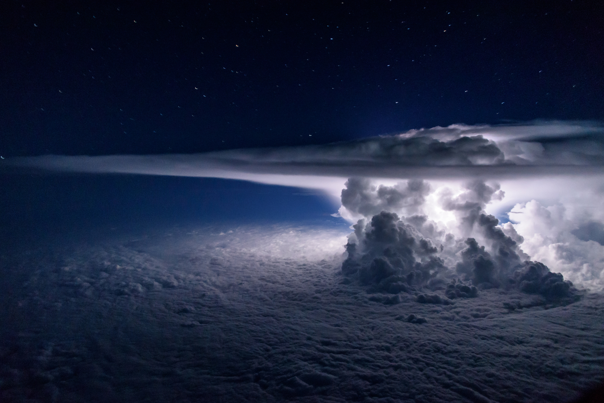 Colossal cumulonimbus clouds over the Pacific Ocean south of Panama City at 37,000 feet. (Santiago Borja)