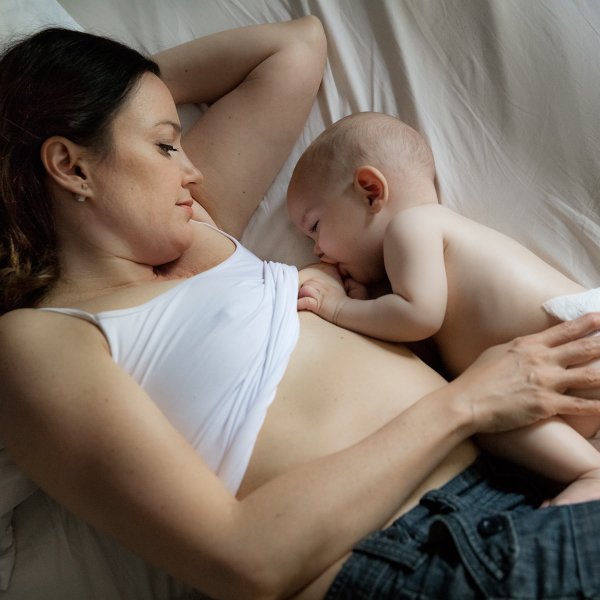 New York City mother Margaret Nichols nurses her son Bo, at 7 months. She originally planned to breastfeed for two years