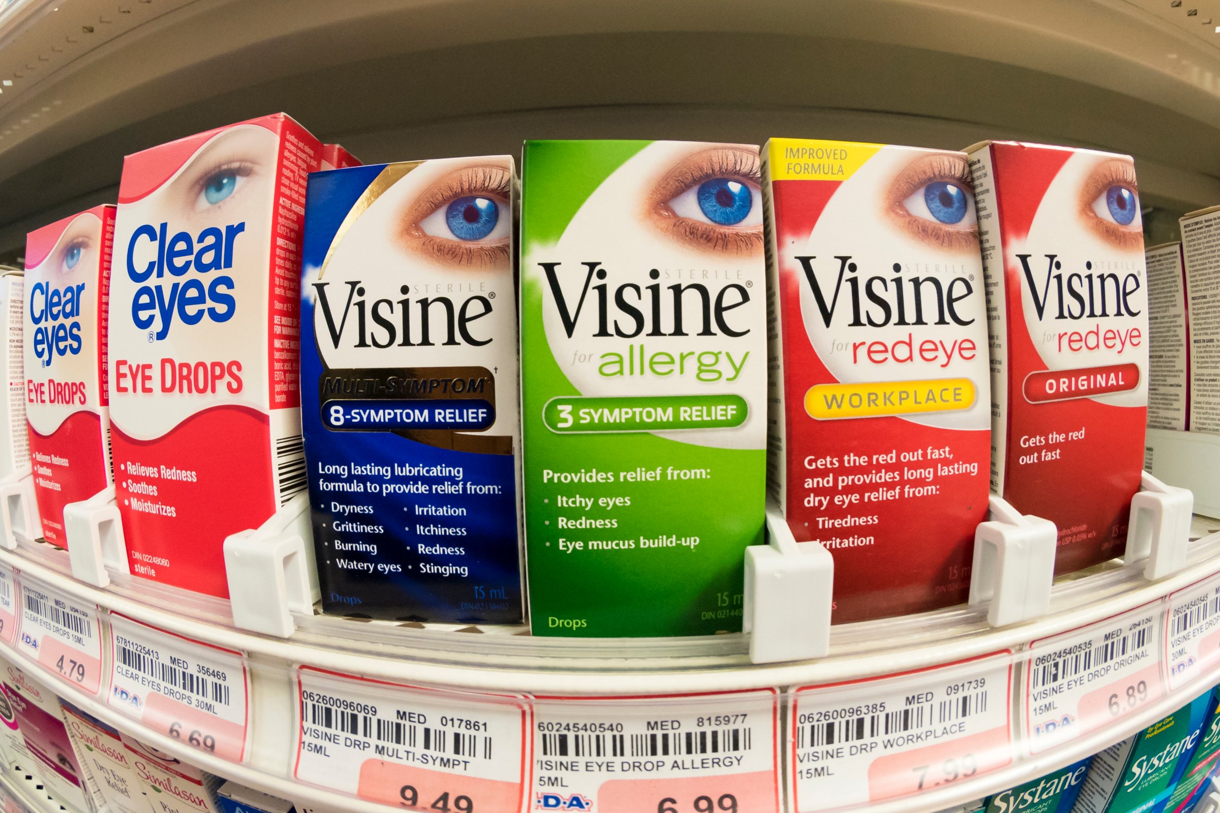 Visine, over the counter eye drops in pharmacy shelf. Visine