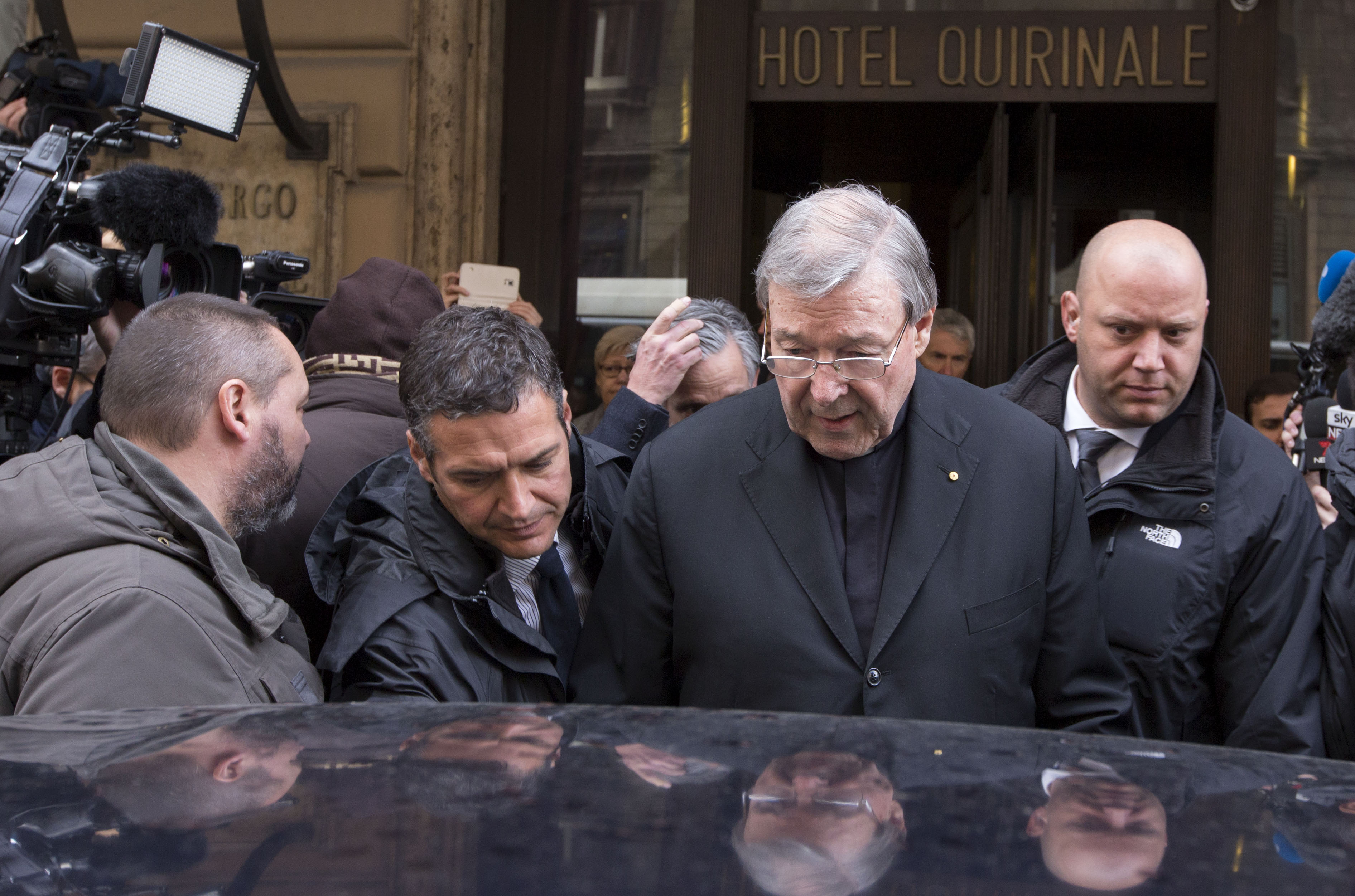 Australian cardinal George Pell leaves the Quirinale hotel after meeting members of an Australian group of relatives and victims of priestly sex abuses, in Rome, Thursday, March 3, 2016. (Riccardo De Luca—AP)