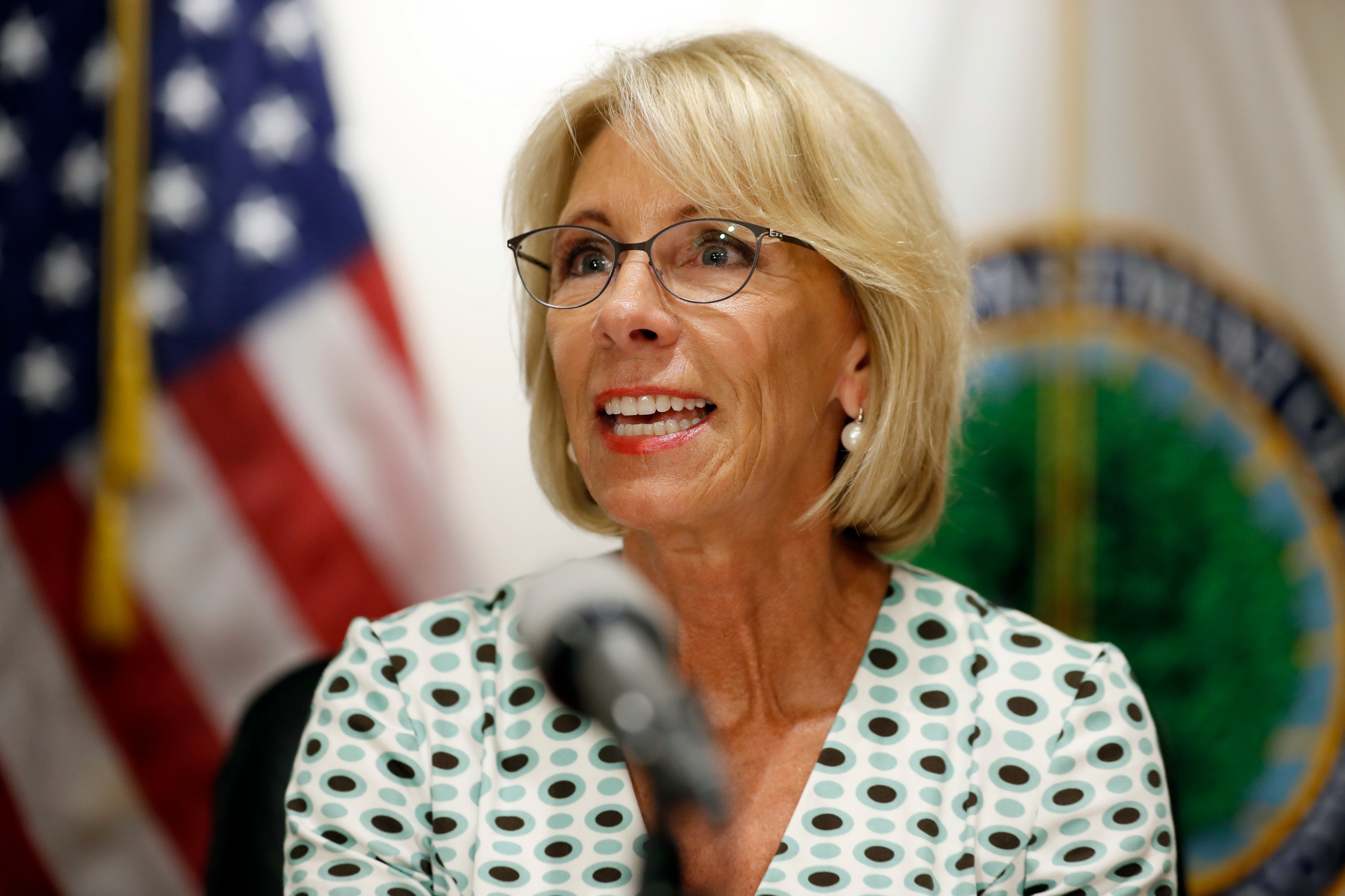 In this July 13, 2017, file photo, Education Secretary Betsy DeVos speaks with the media after a series of listening sessions about campus sexual violence in Washington. (Alex Brandon—AP)