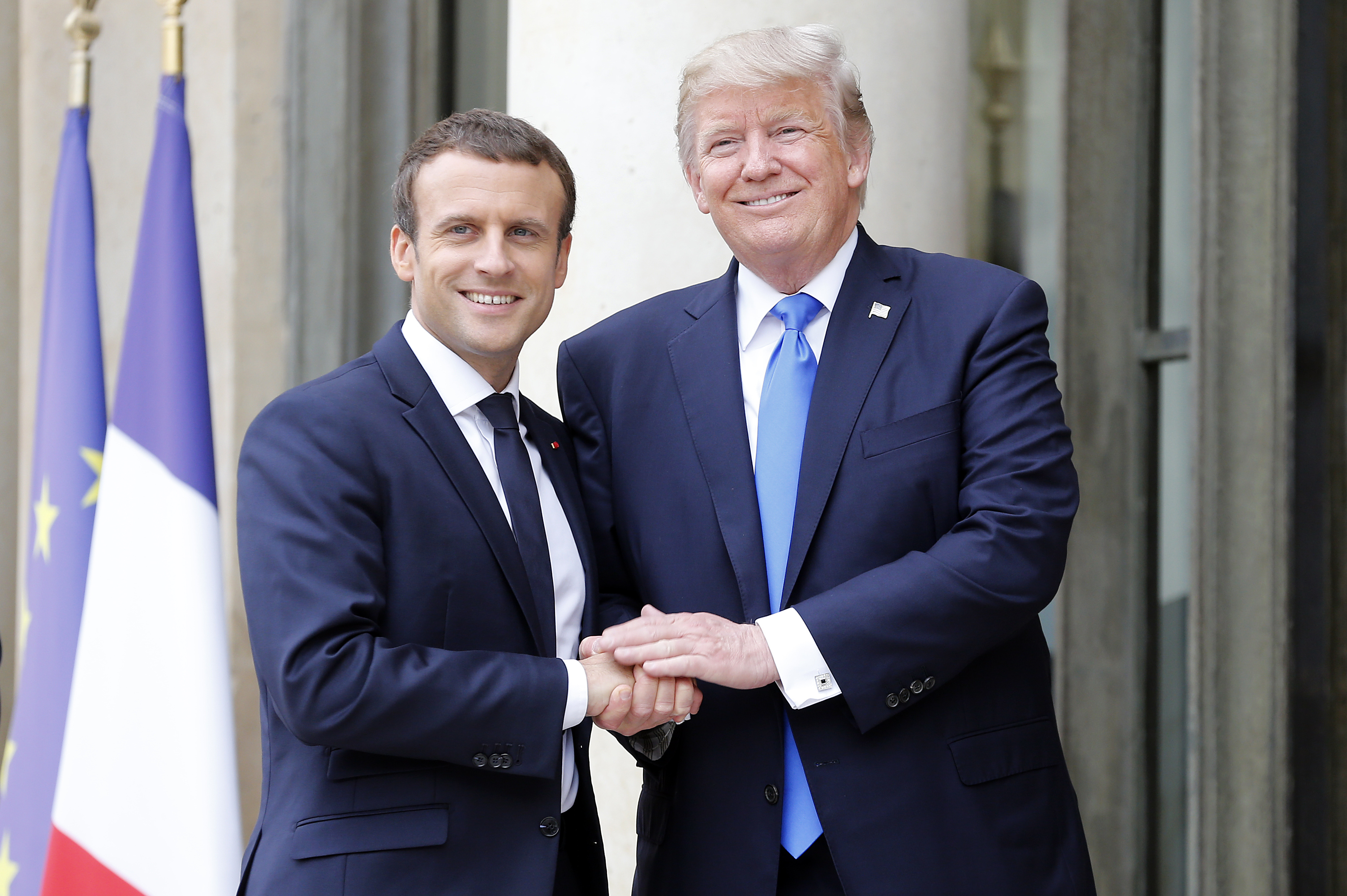 French President Emmanuel Macron welcomes U.S. President Donald Trump prior to a meeting at the Elysee Presidential Palace on July 13, 2017 in Paris, France. (Thierry Chesnot/Getty Images)